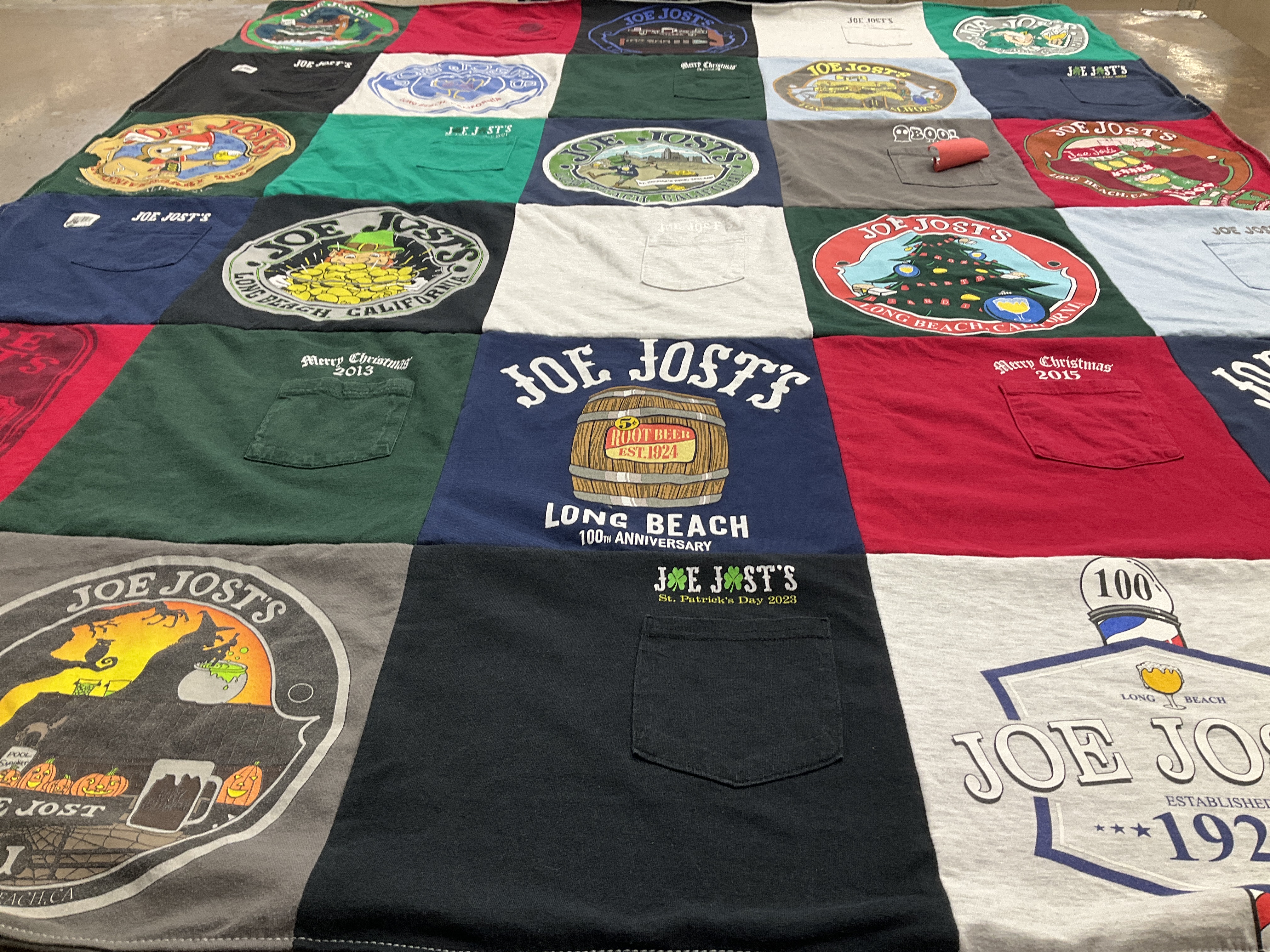 T-shirt quilt with holiday celebrations, local history themes by James from CA