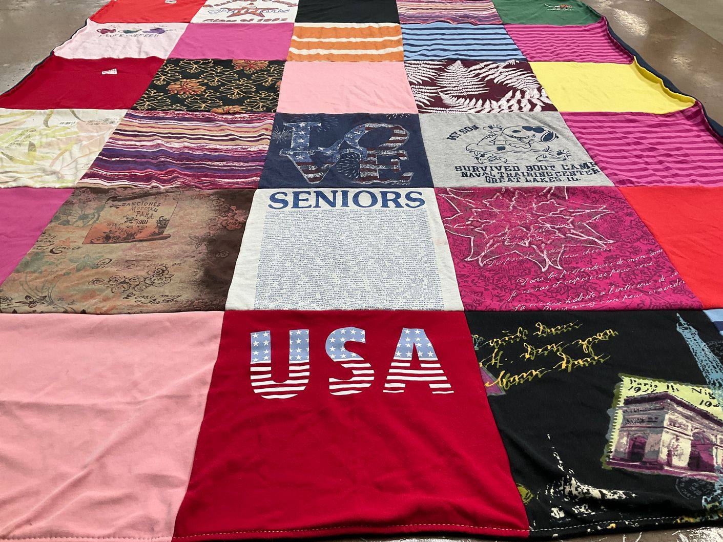 T-shirt quilt with travel, military themes by Jennifer from GA
