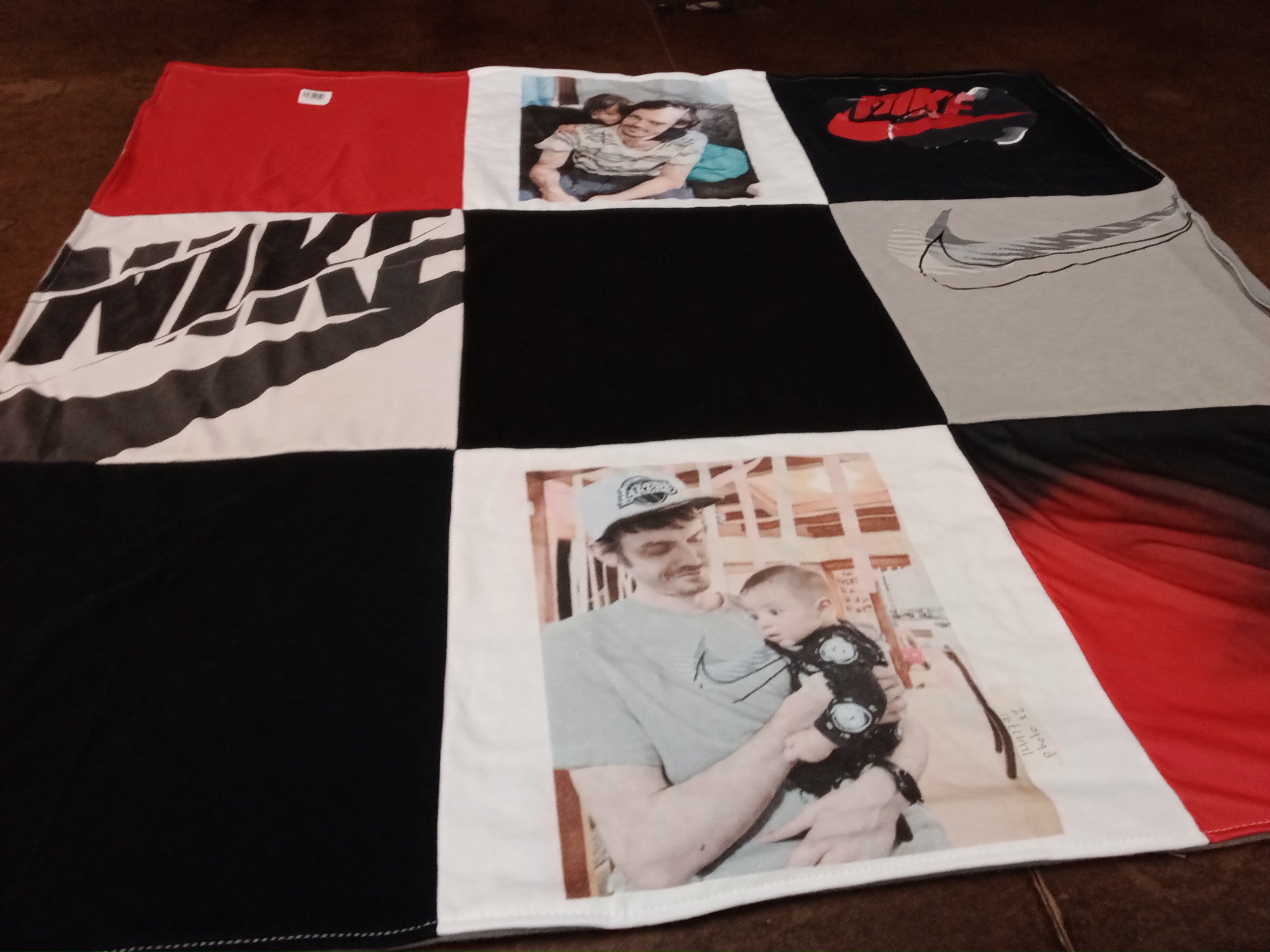 T-shirt quilt with sports, parenting themes by Angela from IA