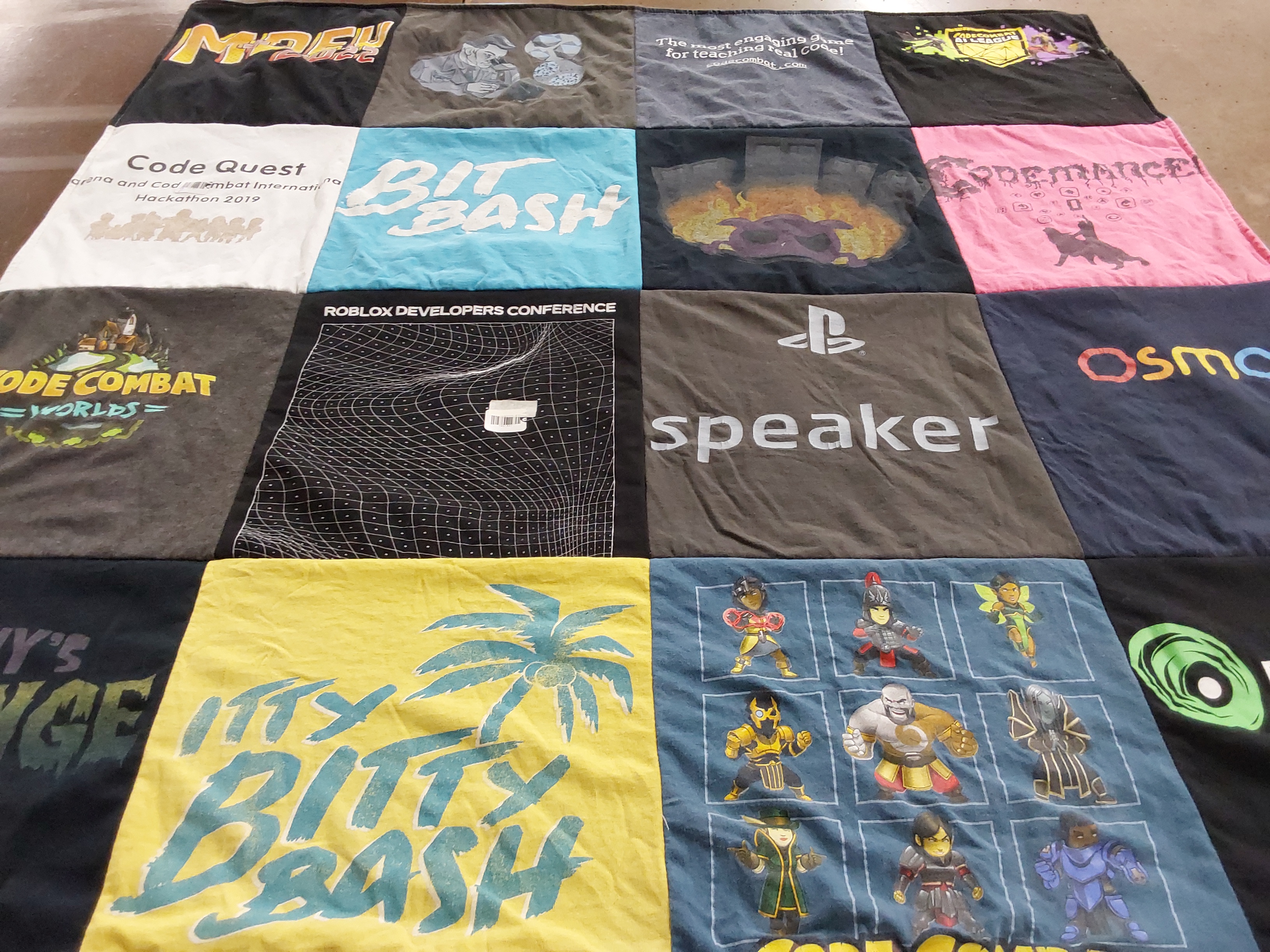 T-shirt quilt with gaming, software development themes by Robert from IL