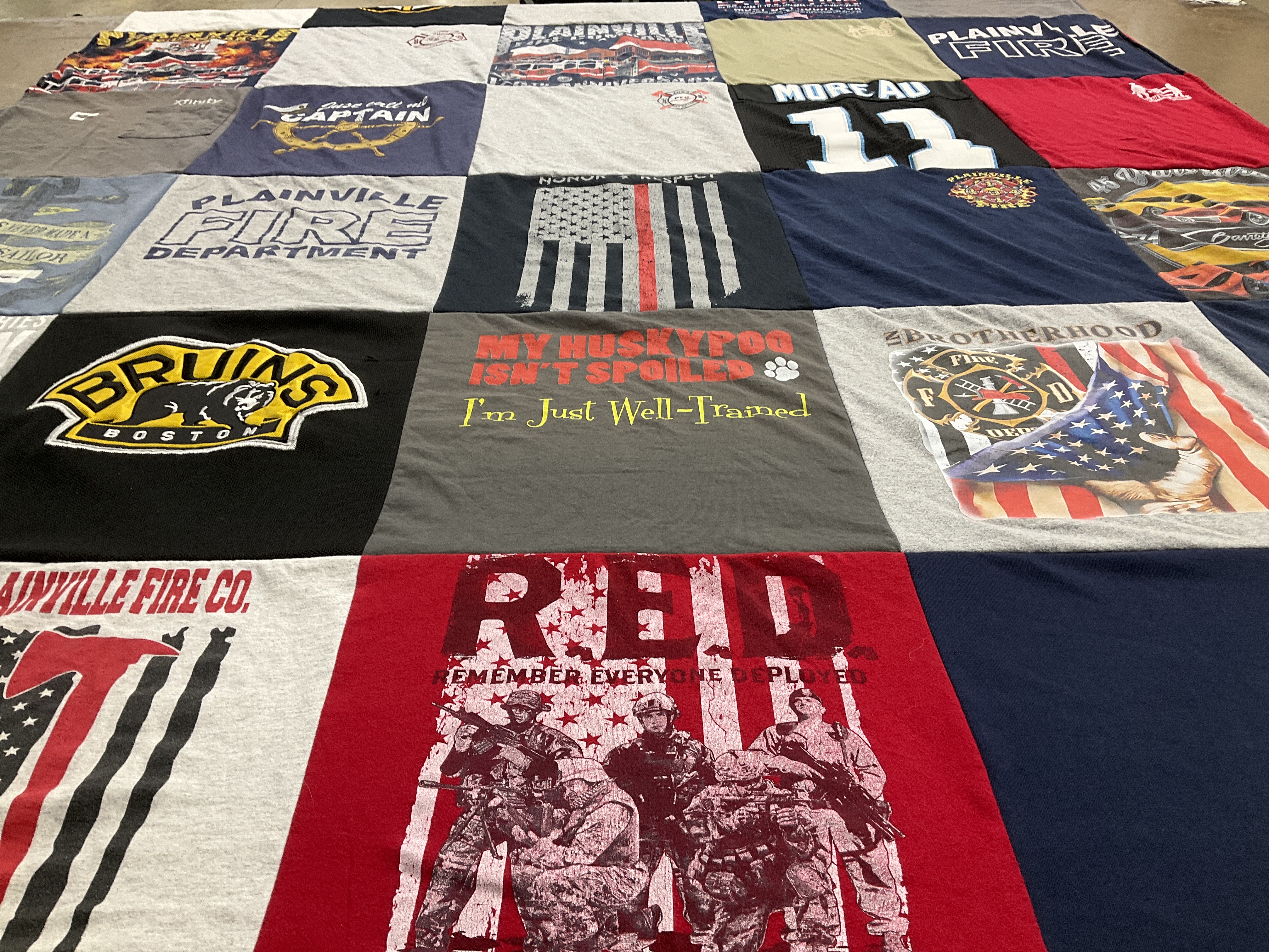 T-shirt quilt with firefighting, military themes by candace from CT