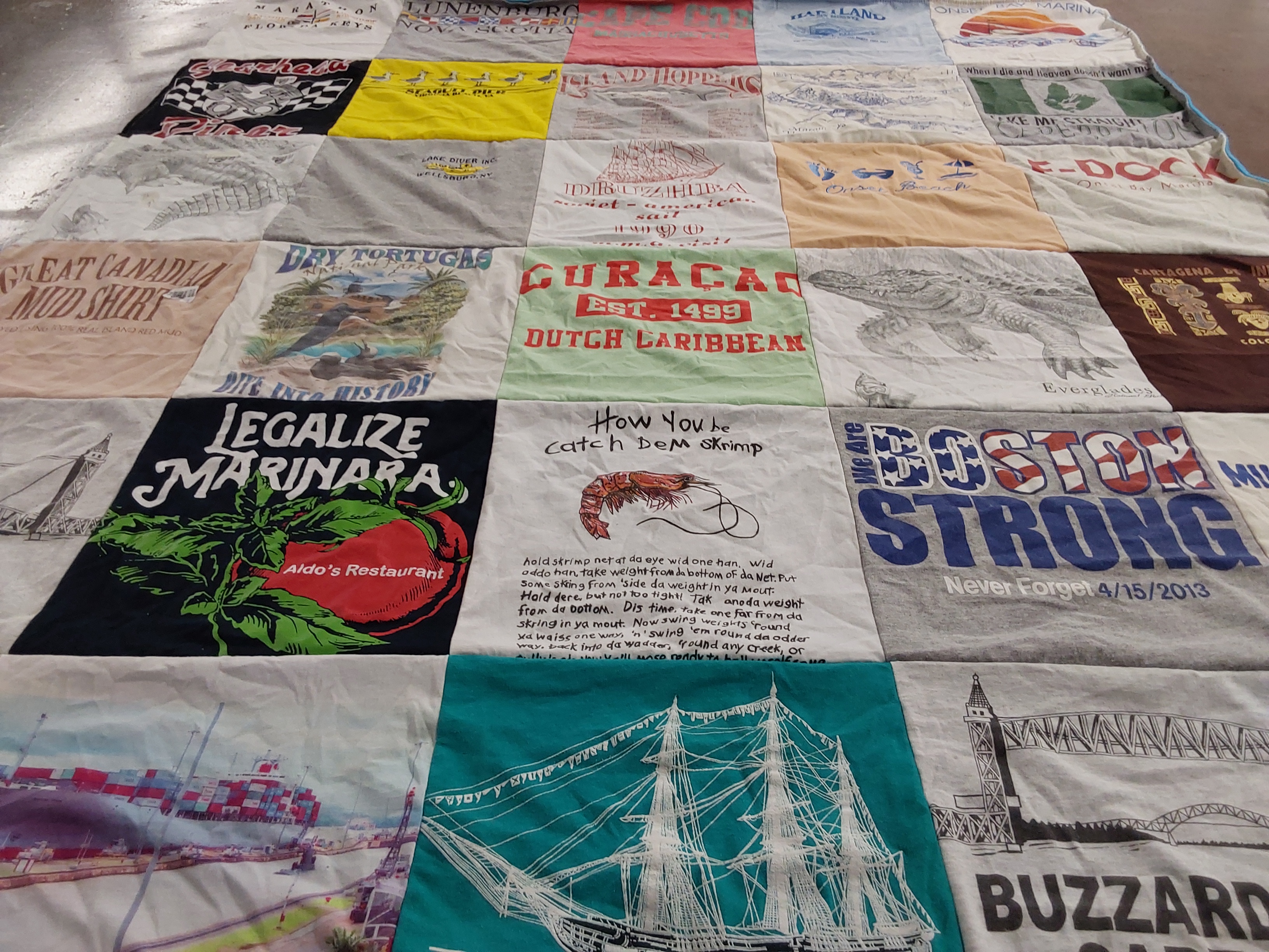 T-shirt quilt with cooking, fishing themes by Margaret from FL