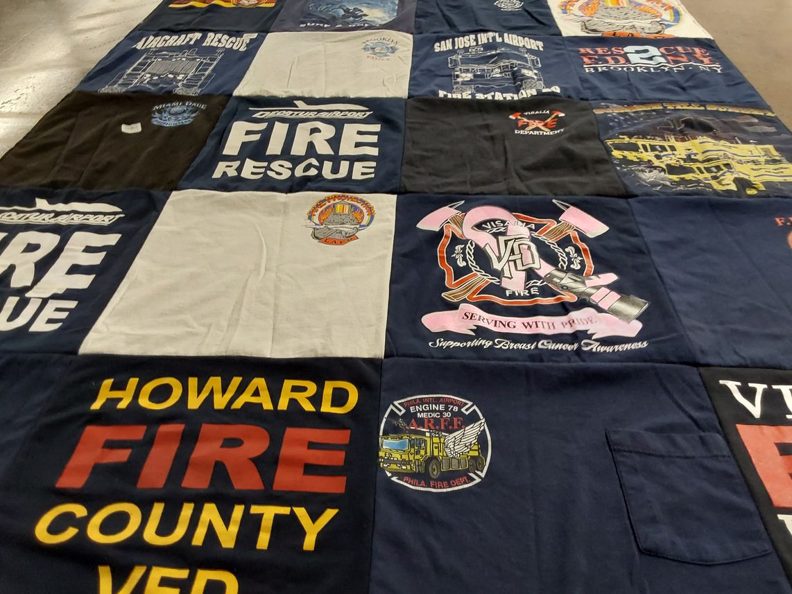 T-shirt quilt with firefighting, rescue operations themes by Kandi from TX