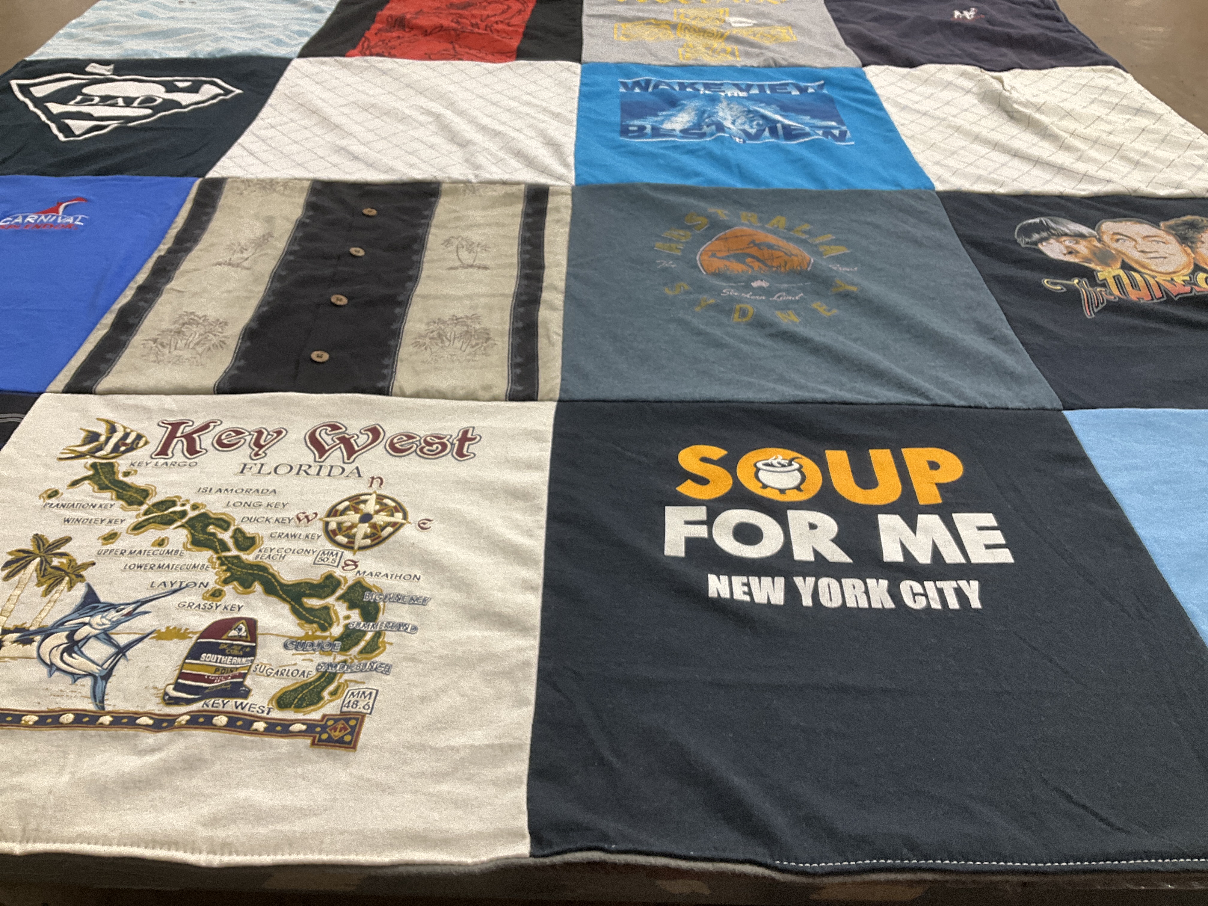 T-shirt quilt with travel, cuisine themes by Christina from NV
