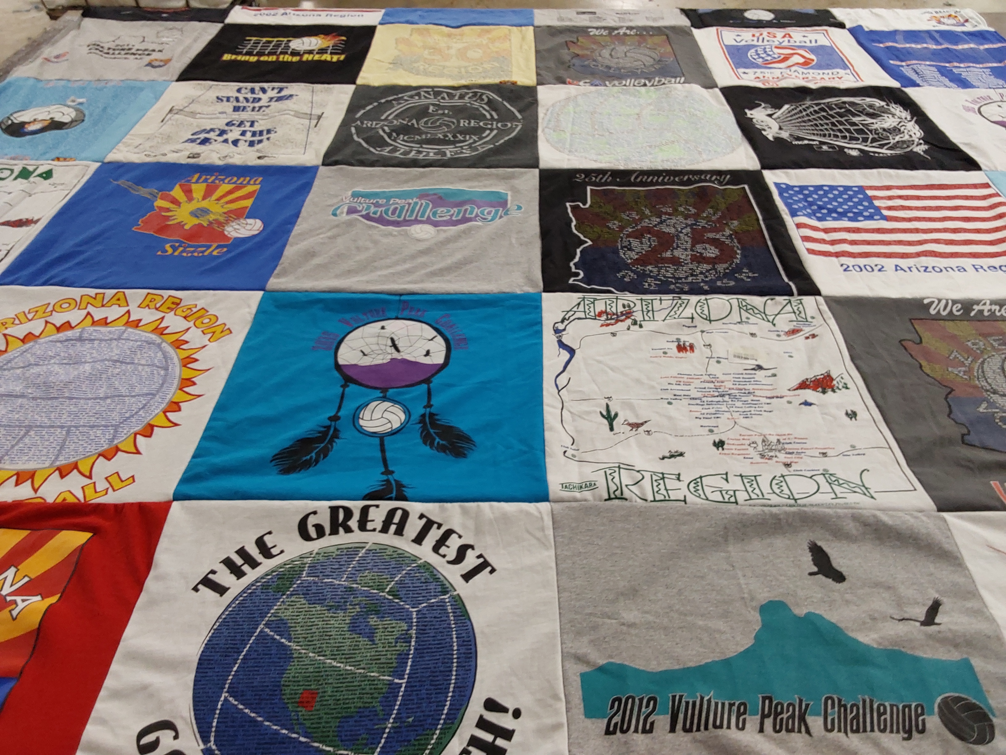 T-shirt quilt with sports, volleyball themes by Harold from AZ
