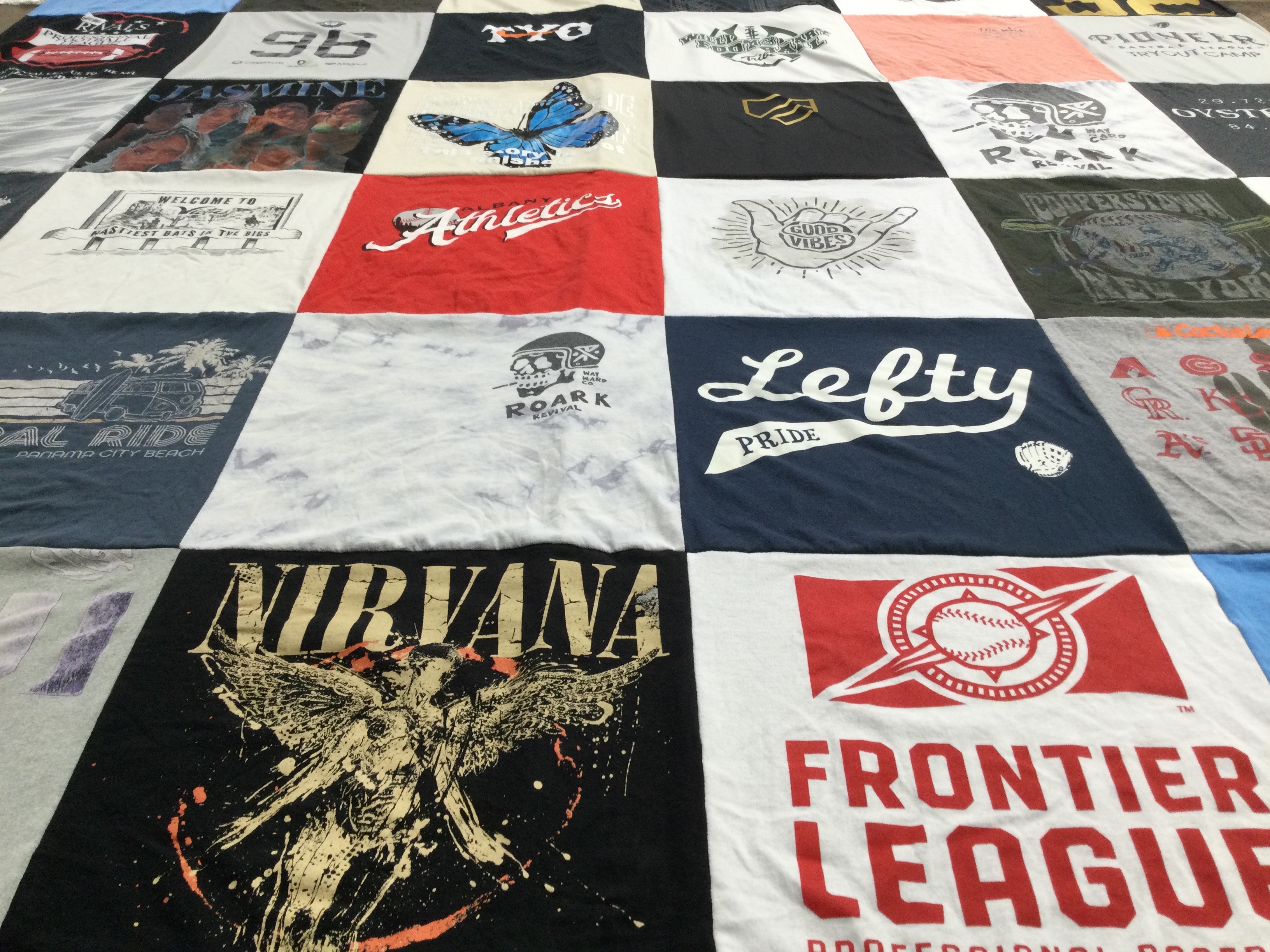 T-shirt quilt with music, sports themes by Tamera from FL