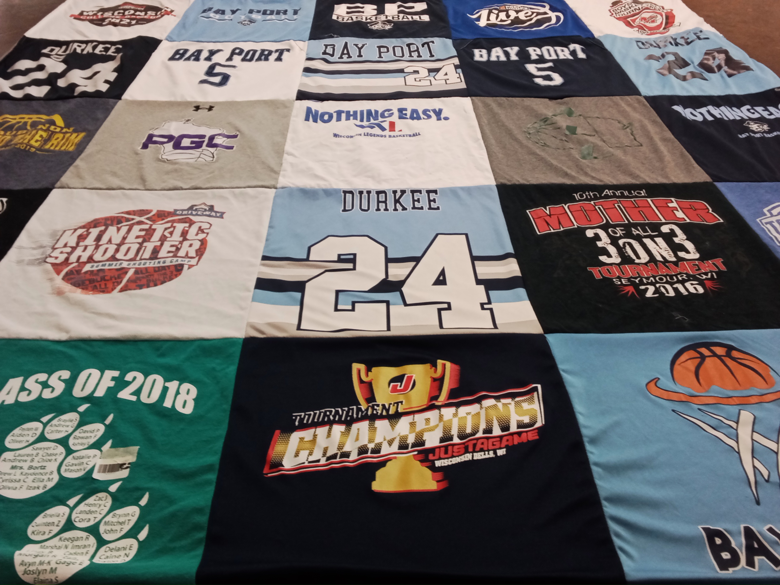 T-shirt quilt featuring bay port basketball team by Ann from WI