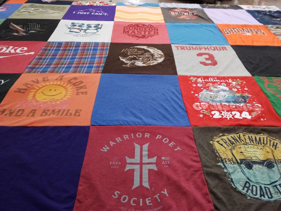 T-shirt quilt with cooking, community themes by Tonya from NY