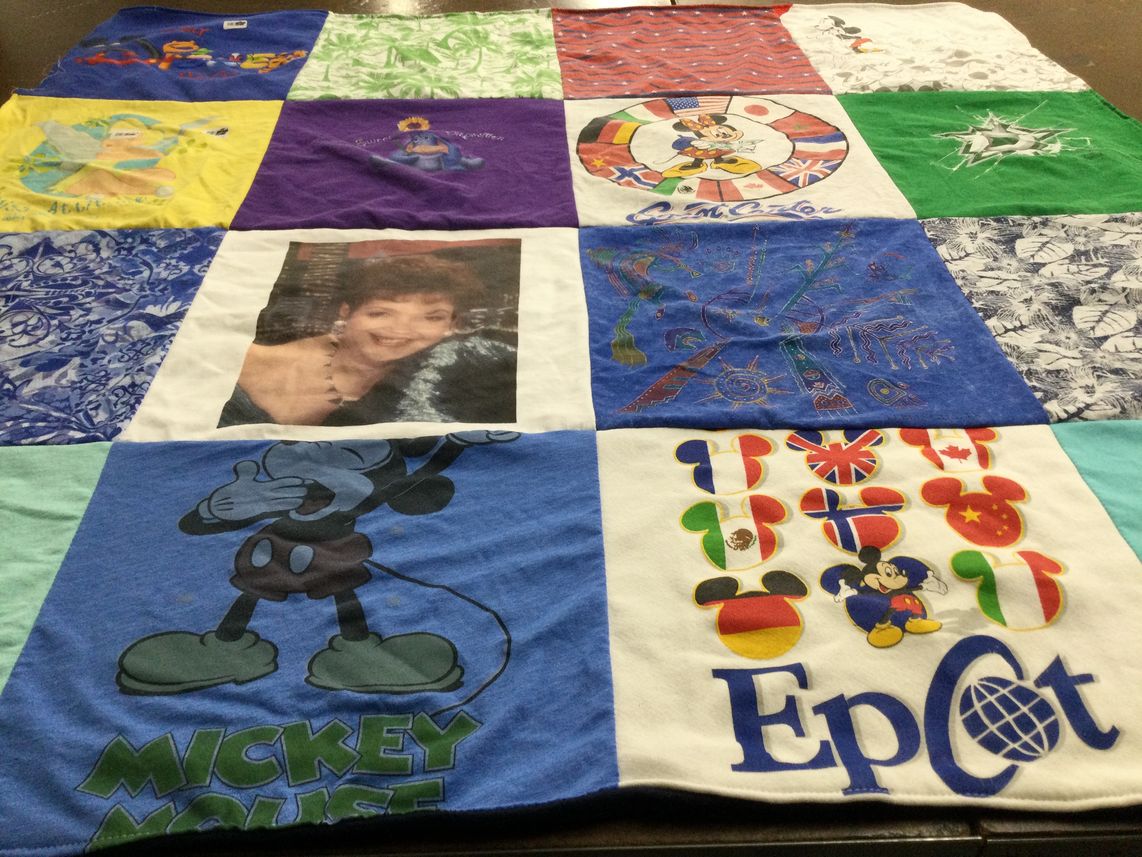 T-shirt quilt with disney, travel themes by Debbi from TX