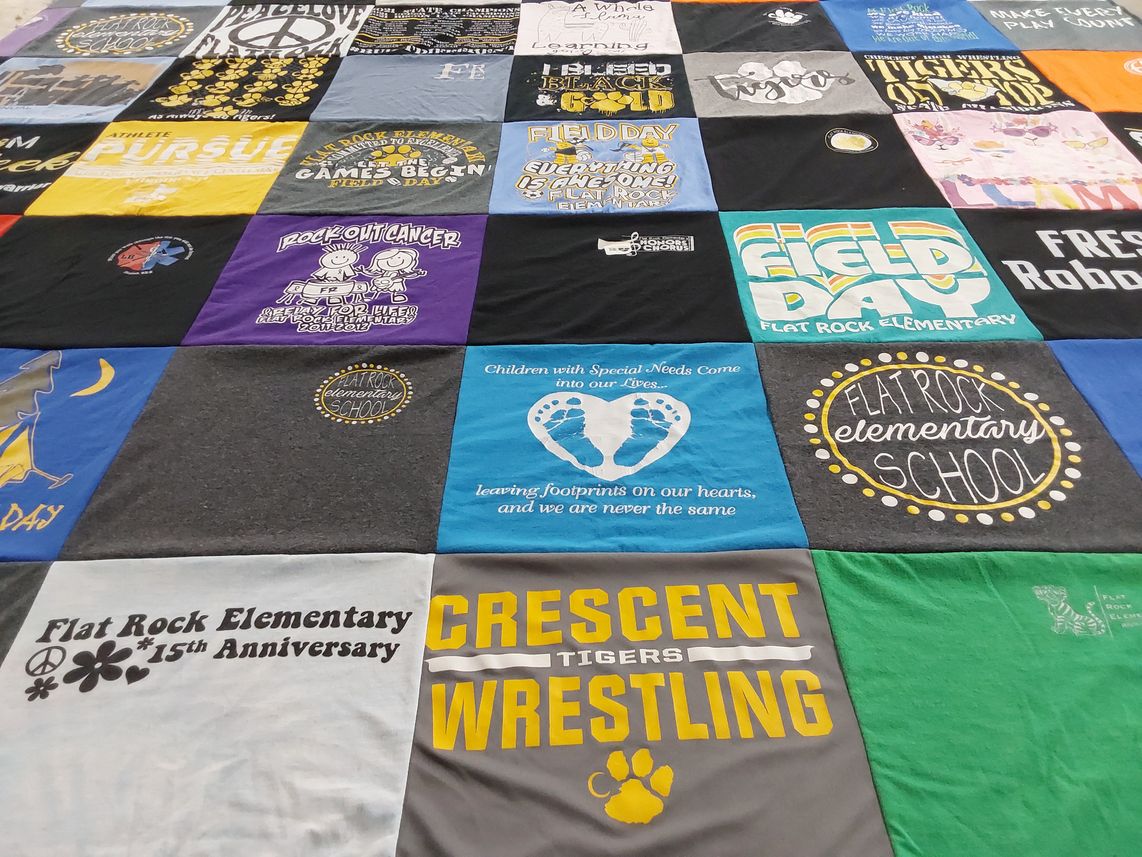 T-shirt quilt featuring crescent tigers wrestling by Lori from SC