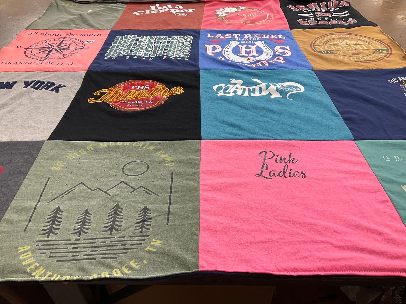T-shirt quilt with theater, adventure themes by Michelle from LA