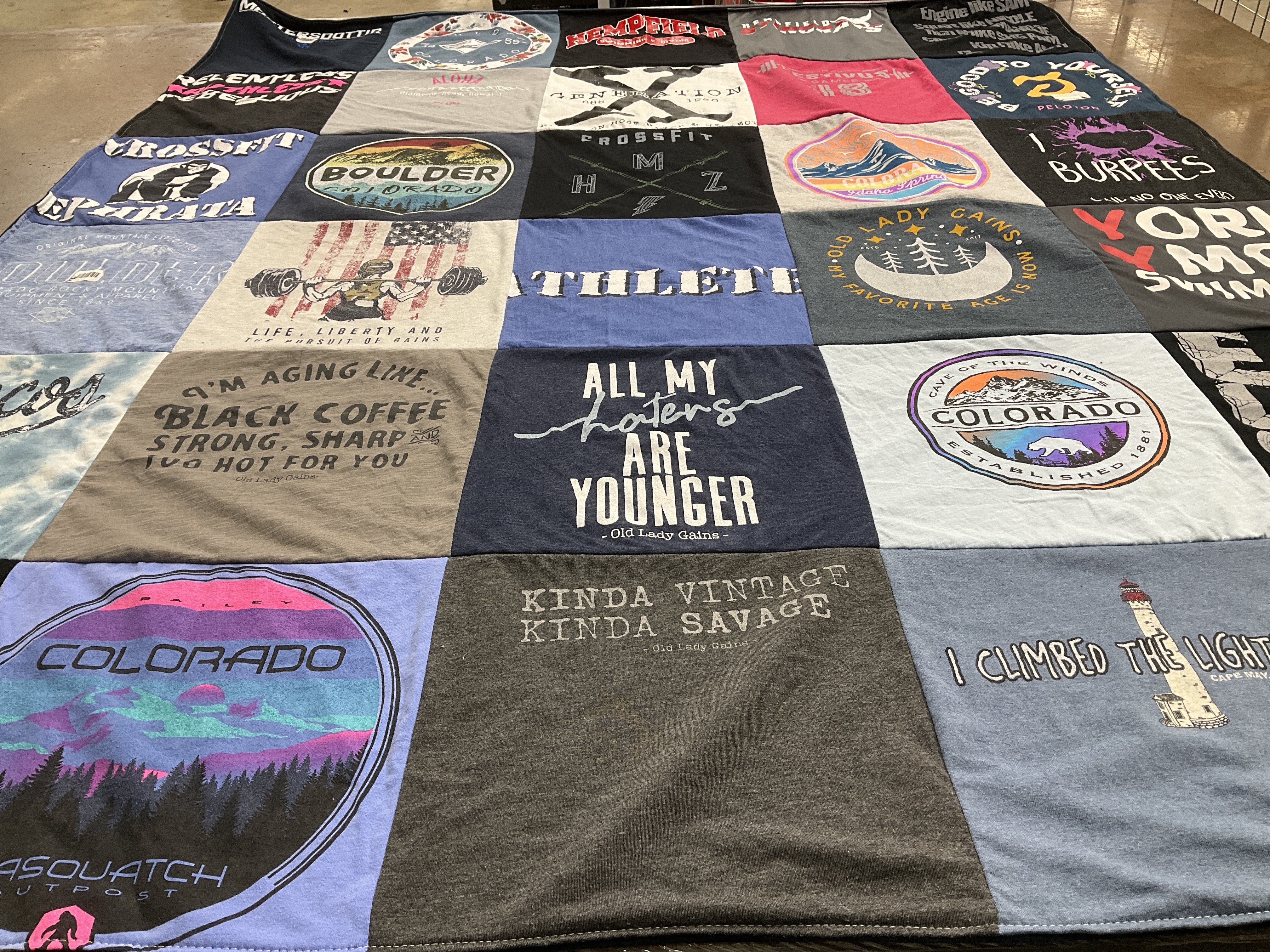 T-shirt quilt with fitness, coffee themes by Caren from PA