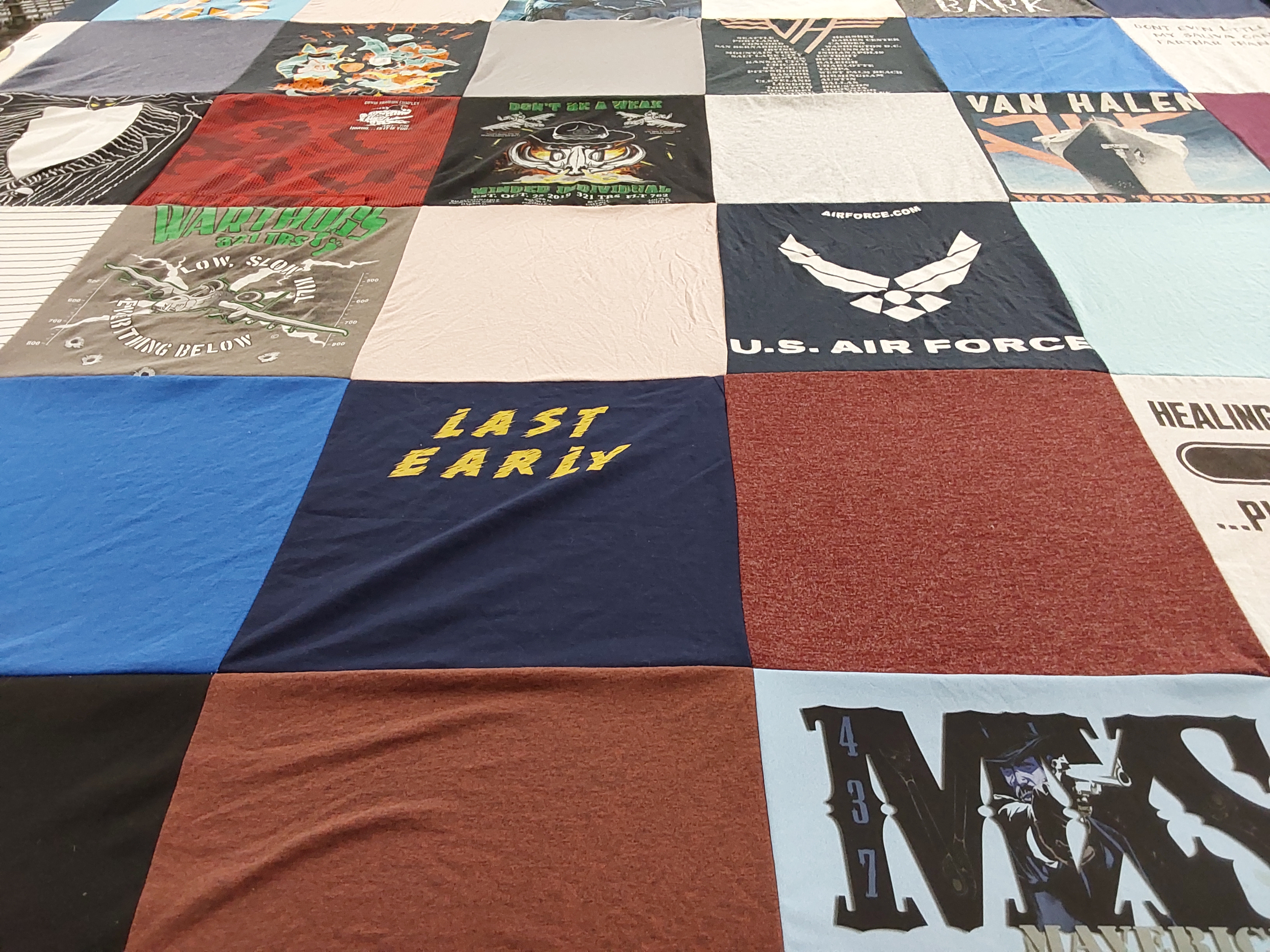 T-shirt quilt with military, music themes by Erica from AR