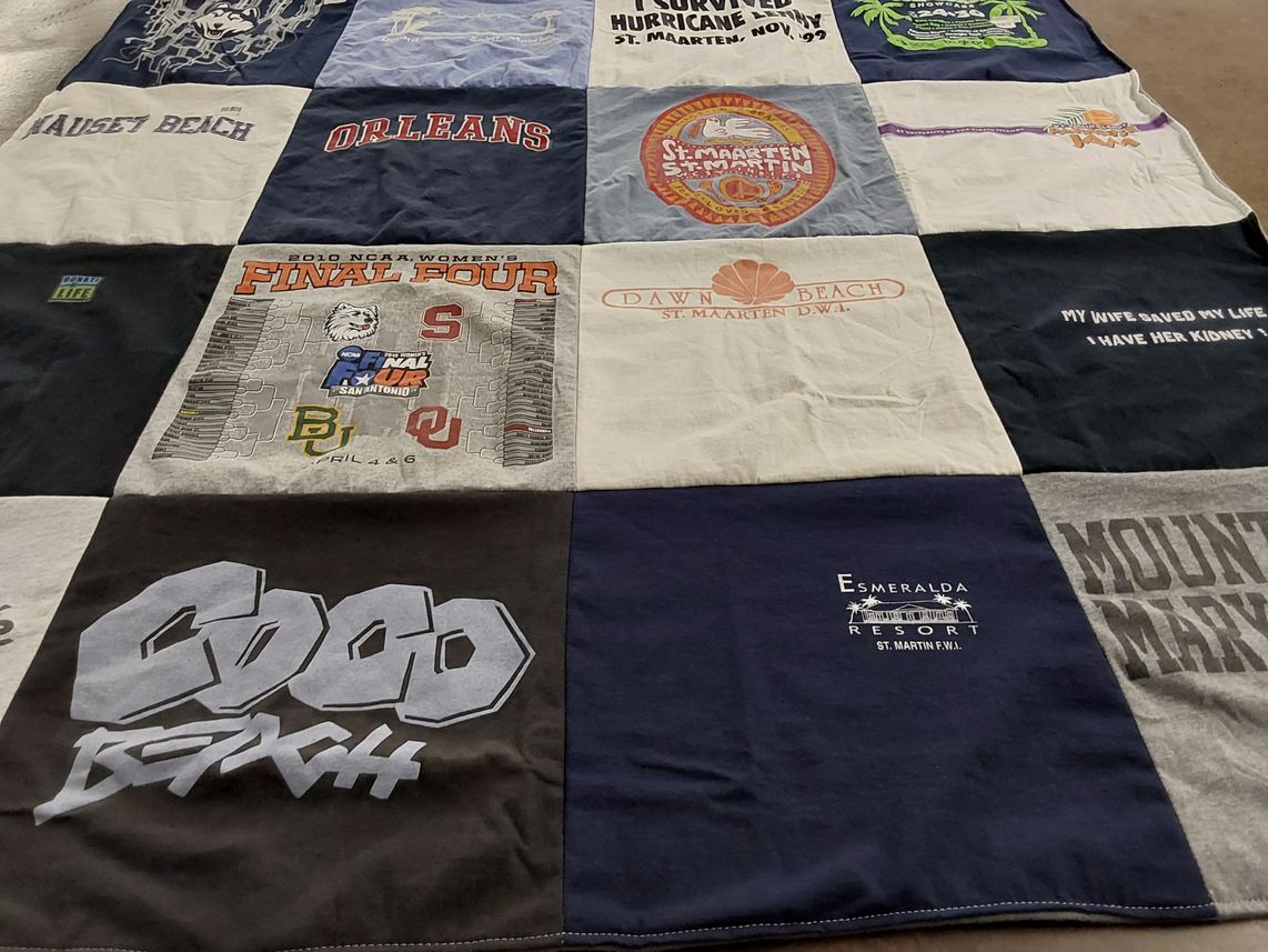 T-shirt quilt with beach, travel themes by Denise from CT
