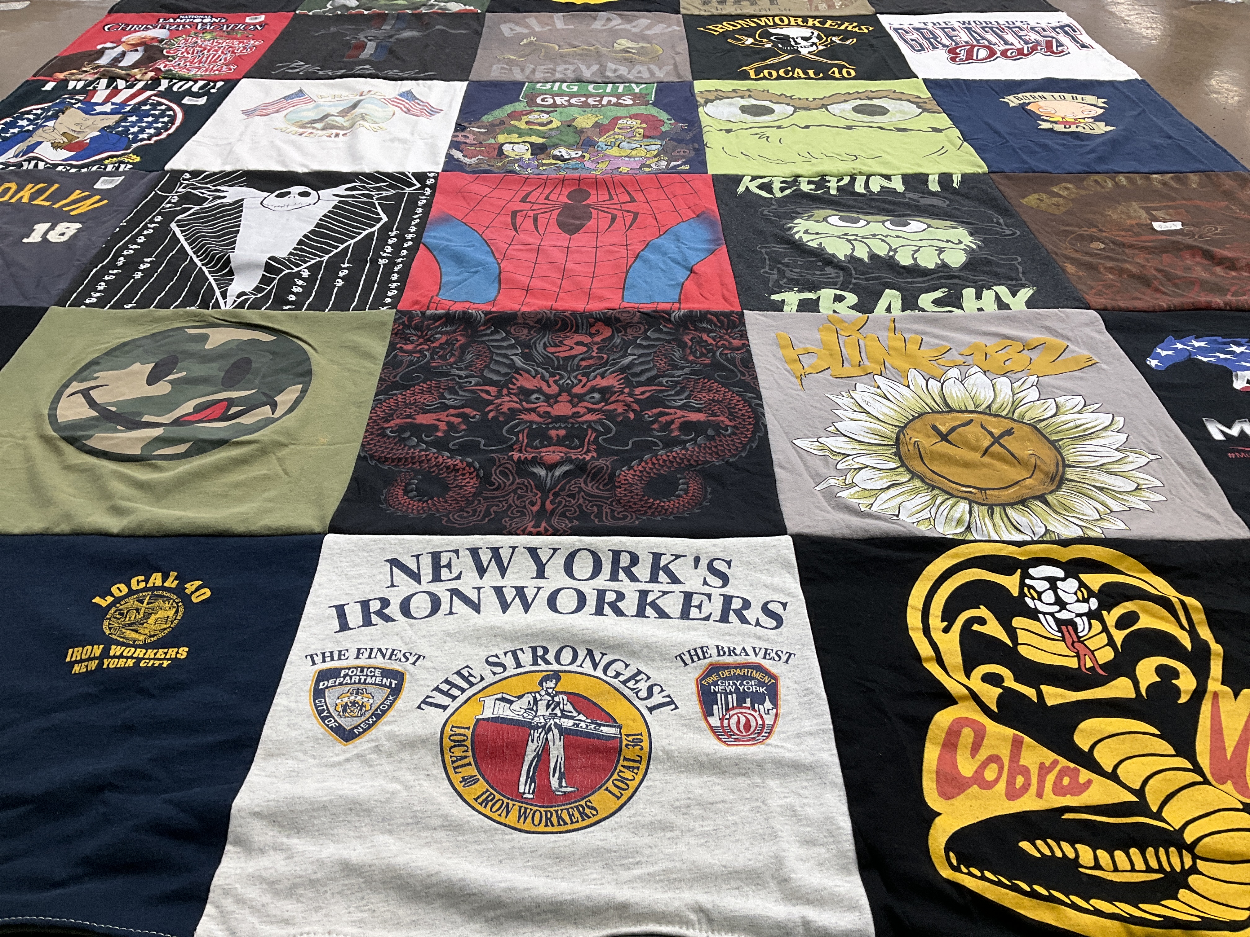 T-shirt quilt with music, art themes by Renay from NY
