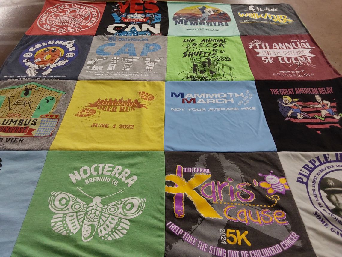 T-shirt quilt with running, charity events themes by Misty from OH