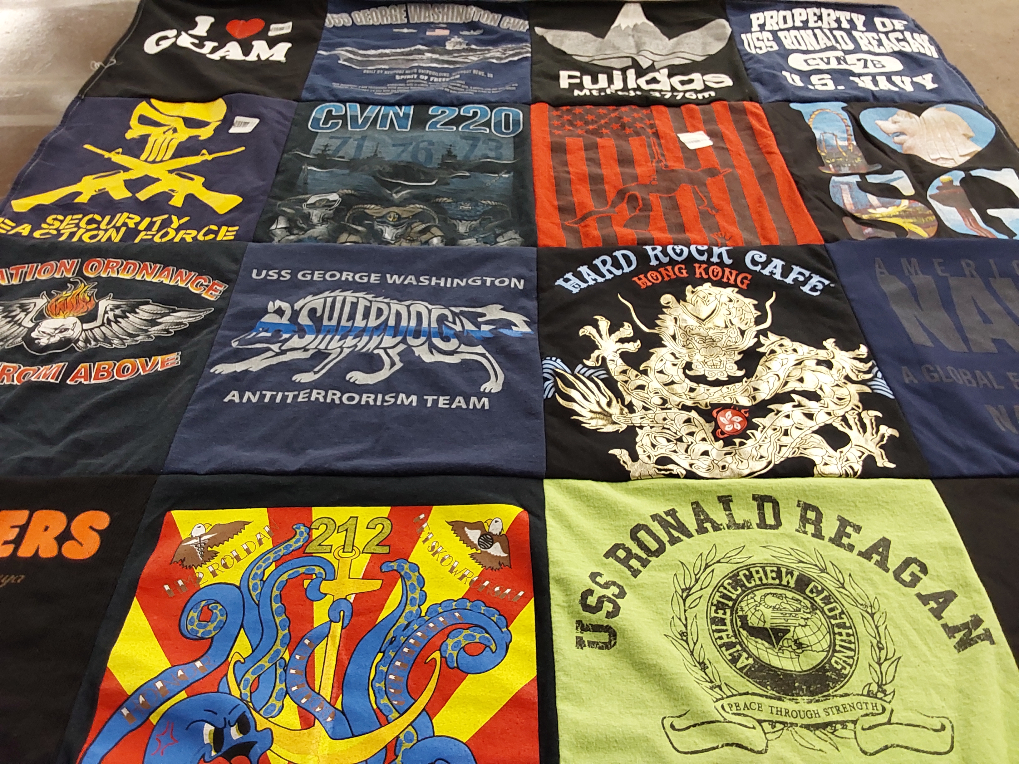 T-shirt quilt with military, travel themes by Alli from FL