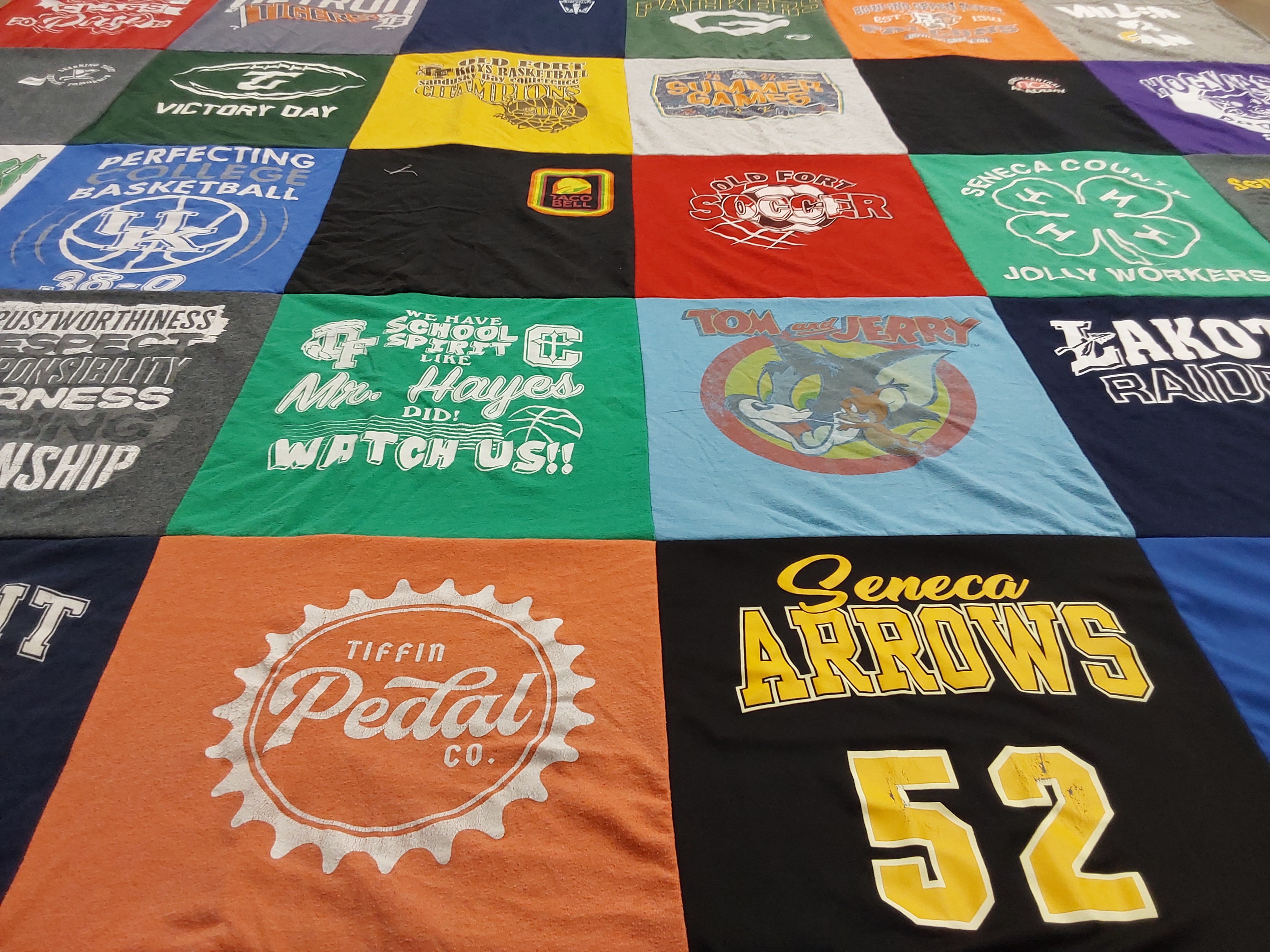 T-shirt quilt featuring seneca arrows, lakota raiders by Laura from OH