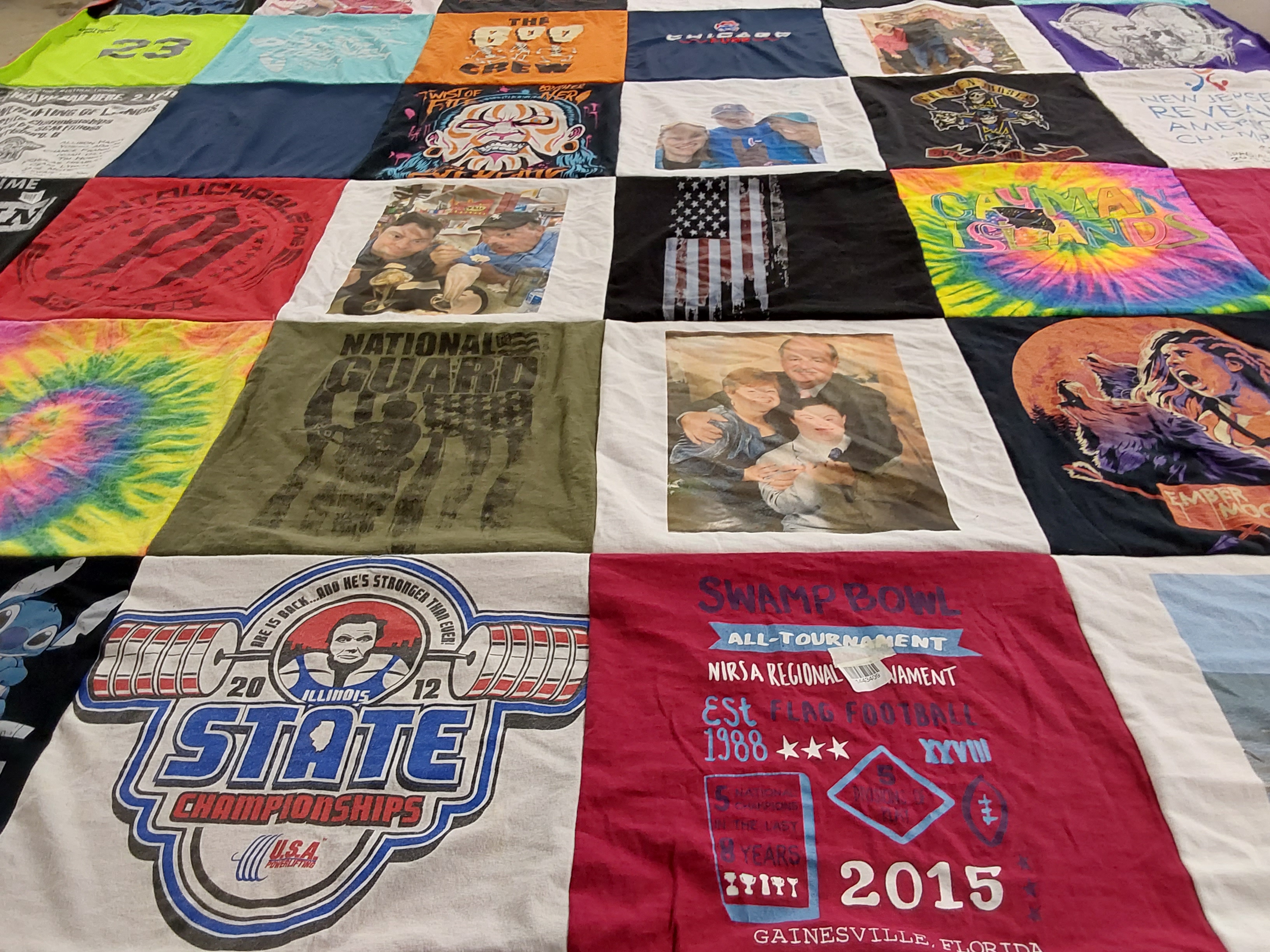 T-shirt quilt with sports, military themes by Jane from TX