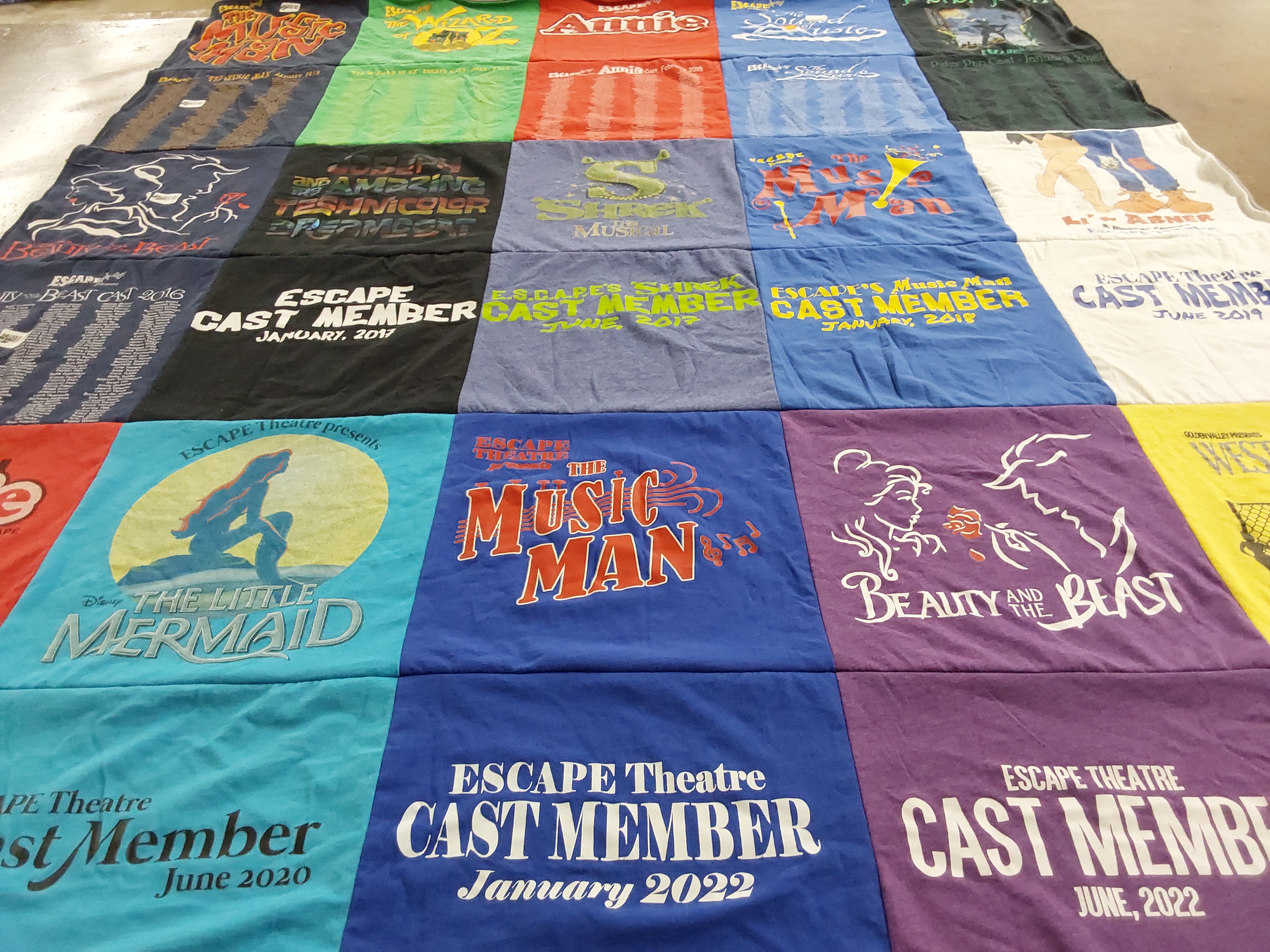 T-shirt quilt with theatre, musicals themes by Dayna from CA