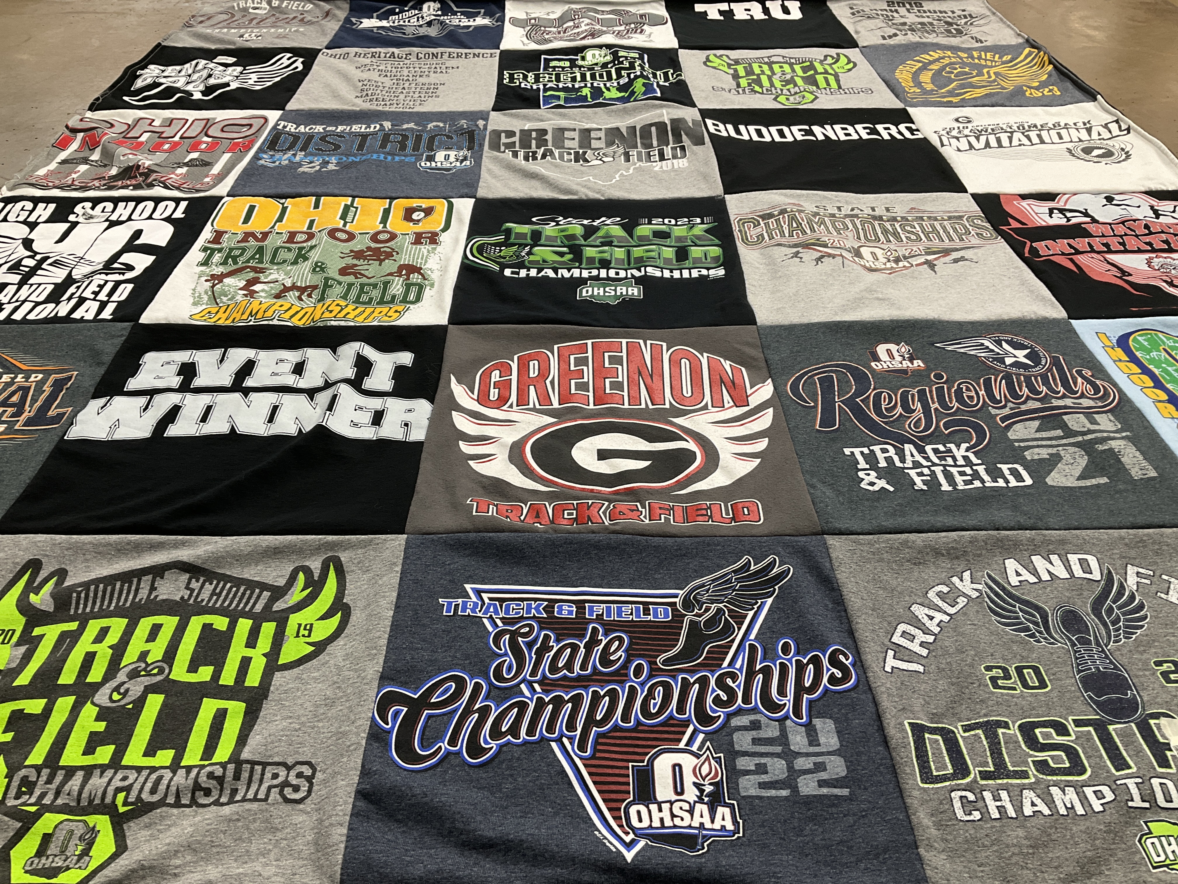 T-shirt quilt featuring greenon track and field, ohio track and field by Suzie from OH