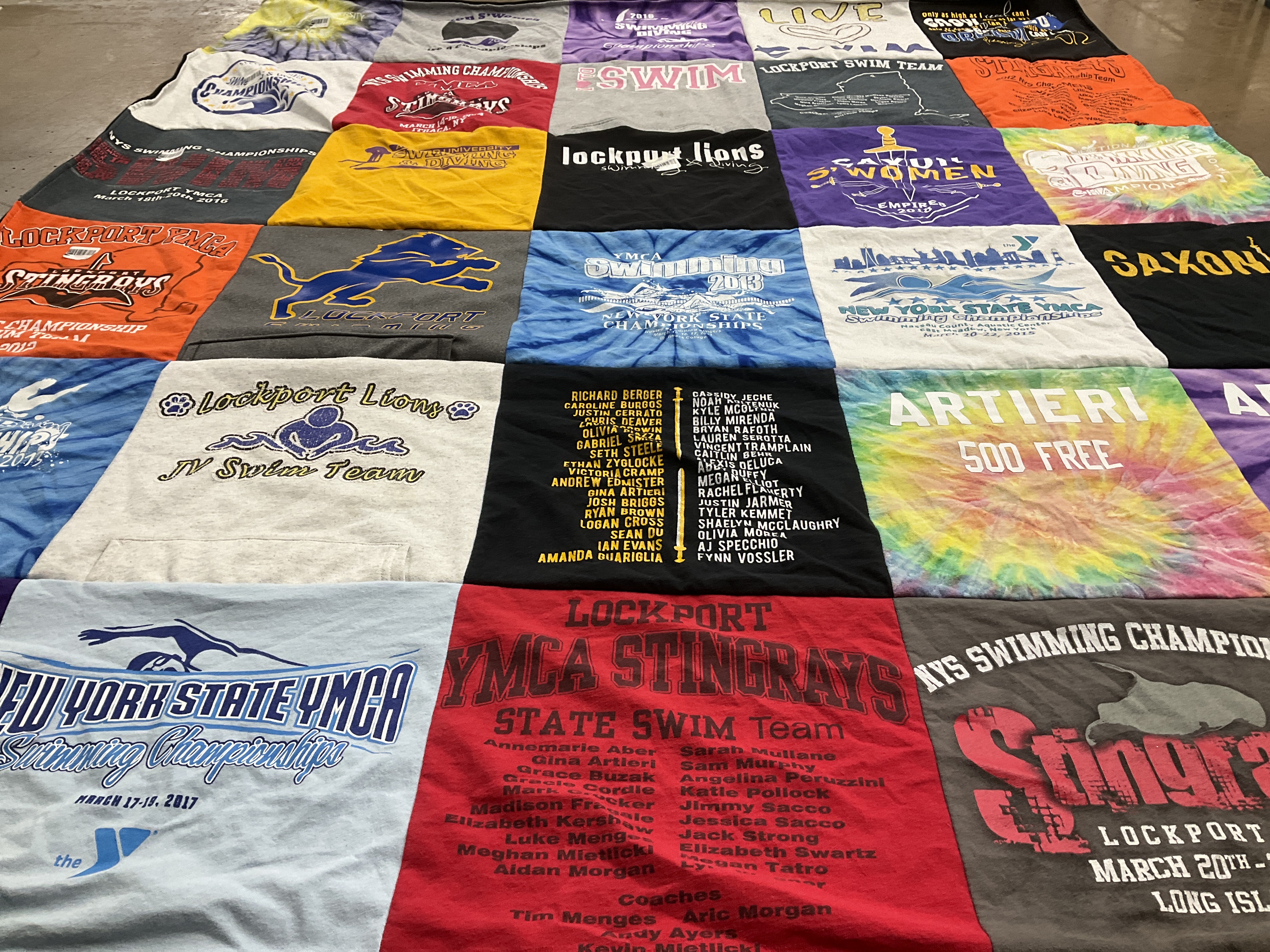 T-shirt quilt featuring lockport swimming team, lockport lions jv swim team by DENISE from NY