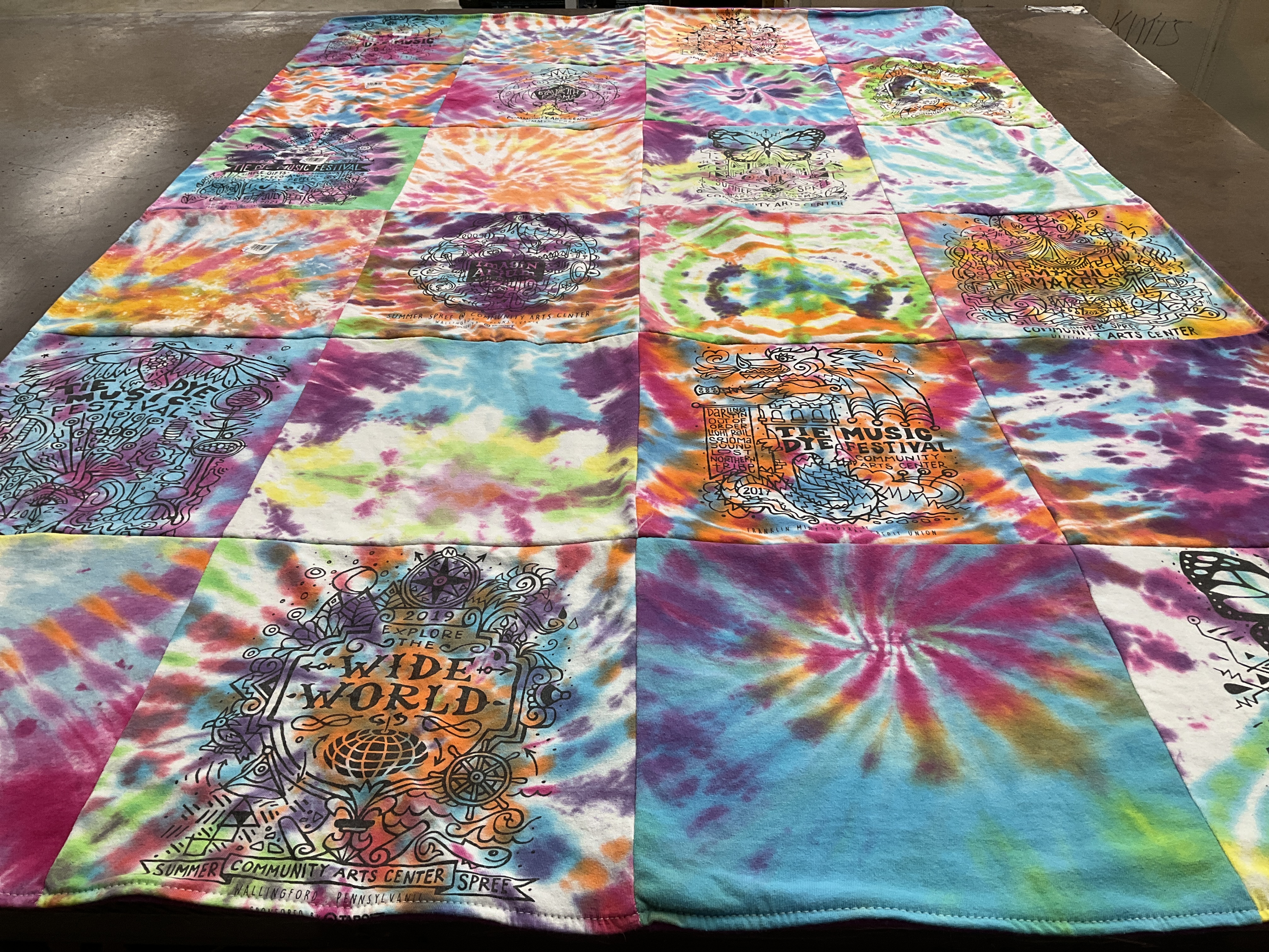 Custom Project Repat t-shirt quilt highlighting music, arts themes.