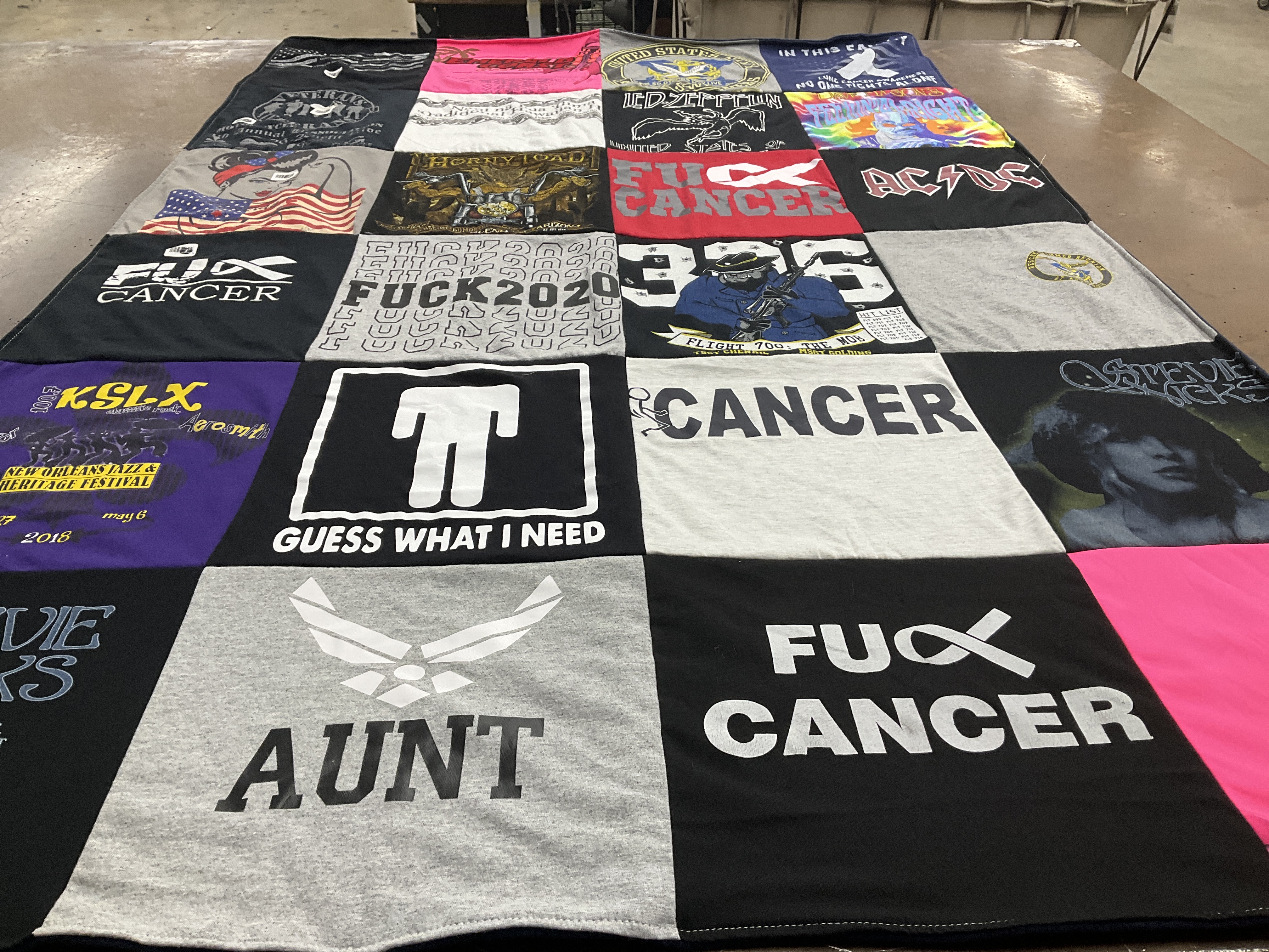 T-shirt quilt with music, cancer awareness themes by Teri from AZ