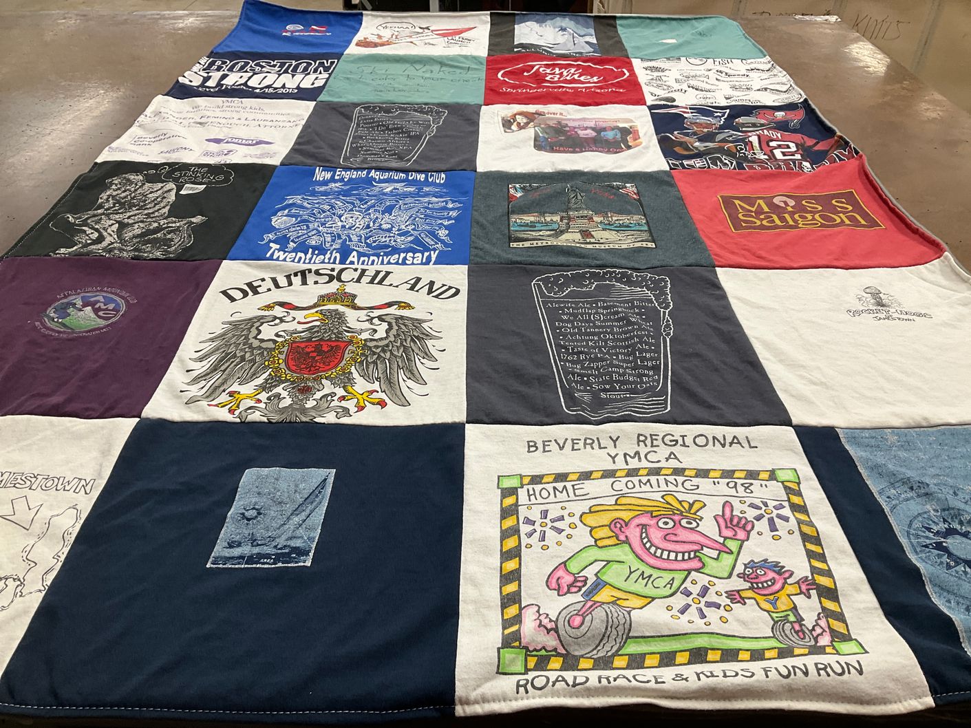 T-shirt quilt with diving, theater themes by Eva from RI