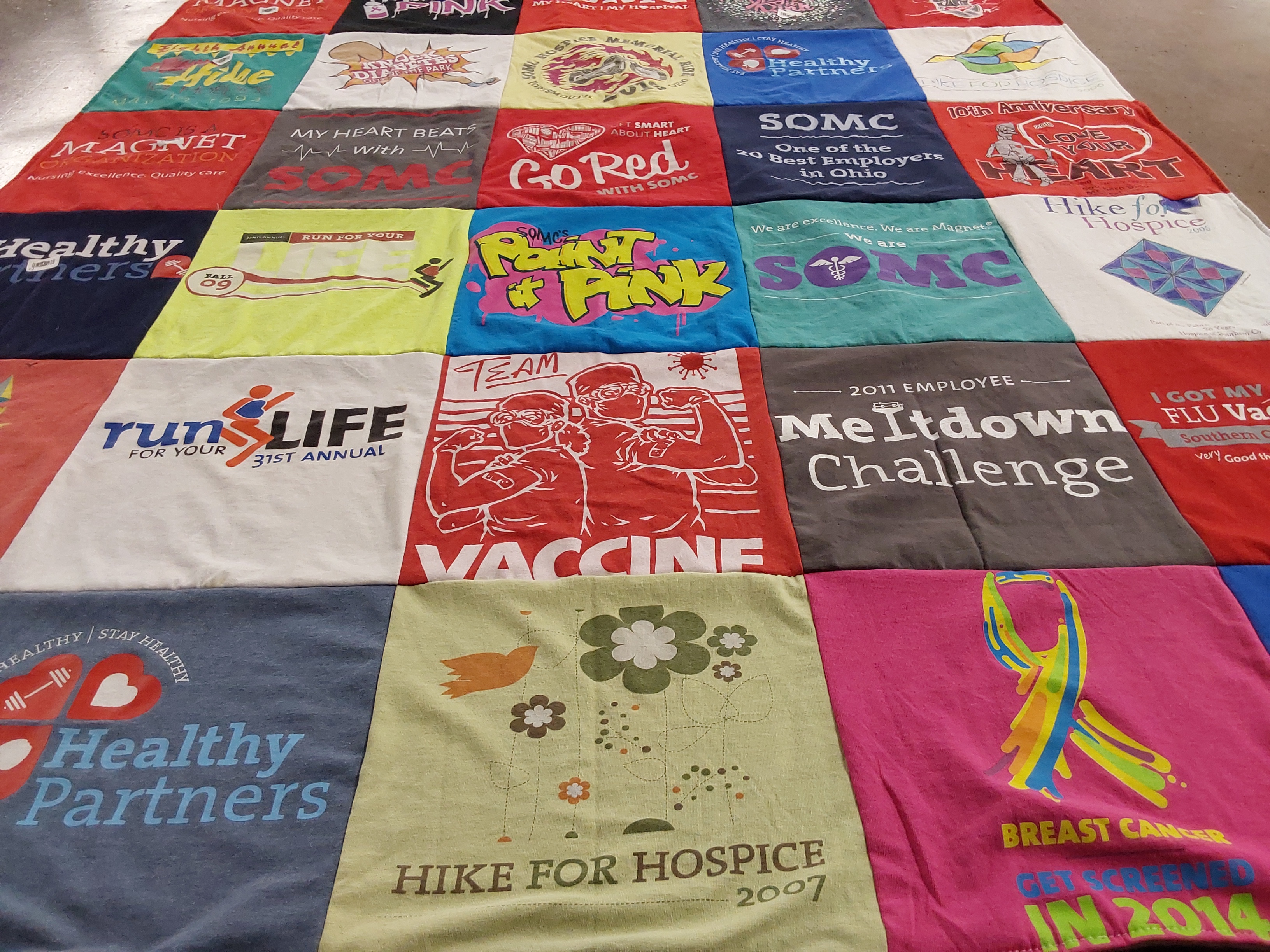 T-shirt quilt with health, fitness themes by Jerri from OH