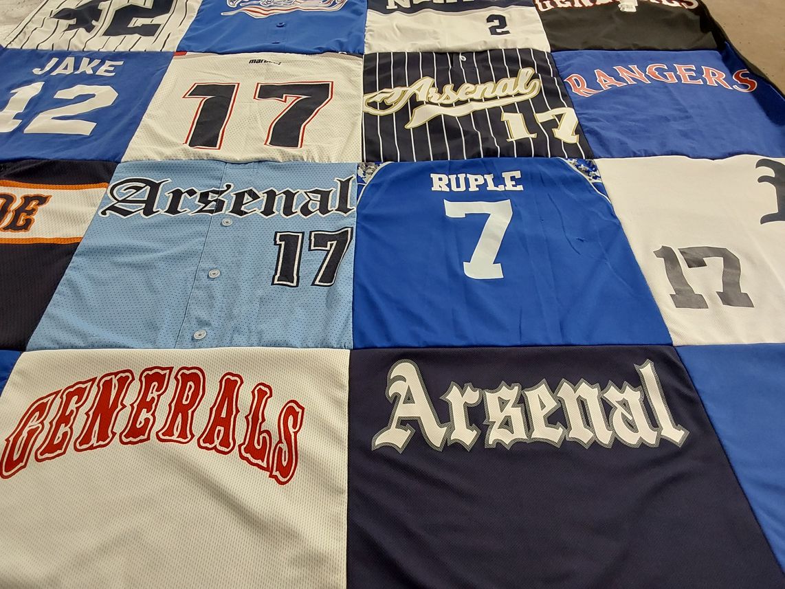 T-shirt quilt with sports themes by Jake from PA