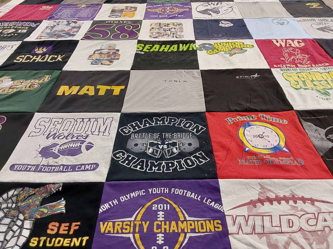T-shirt quilt featuring sequim wolves youth football team by Kathy from WA