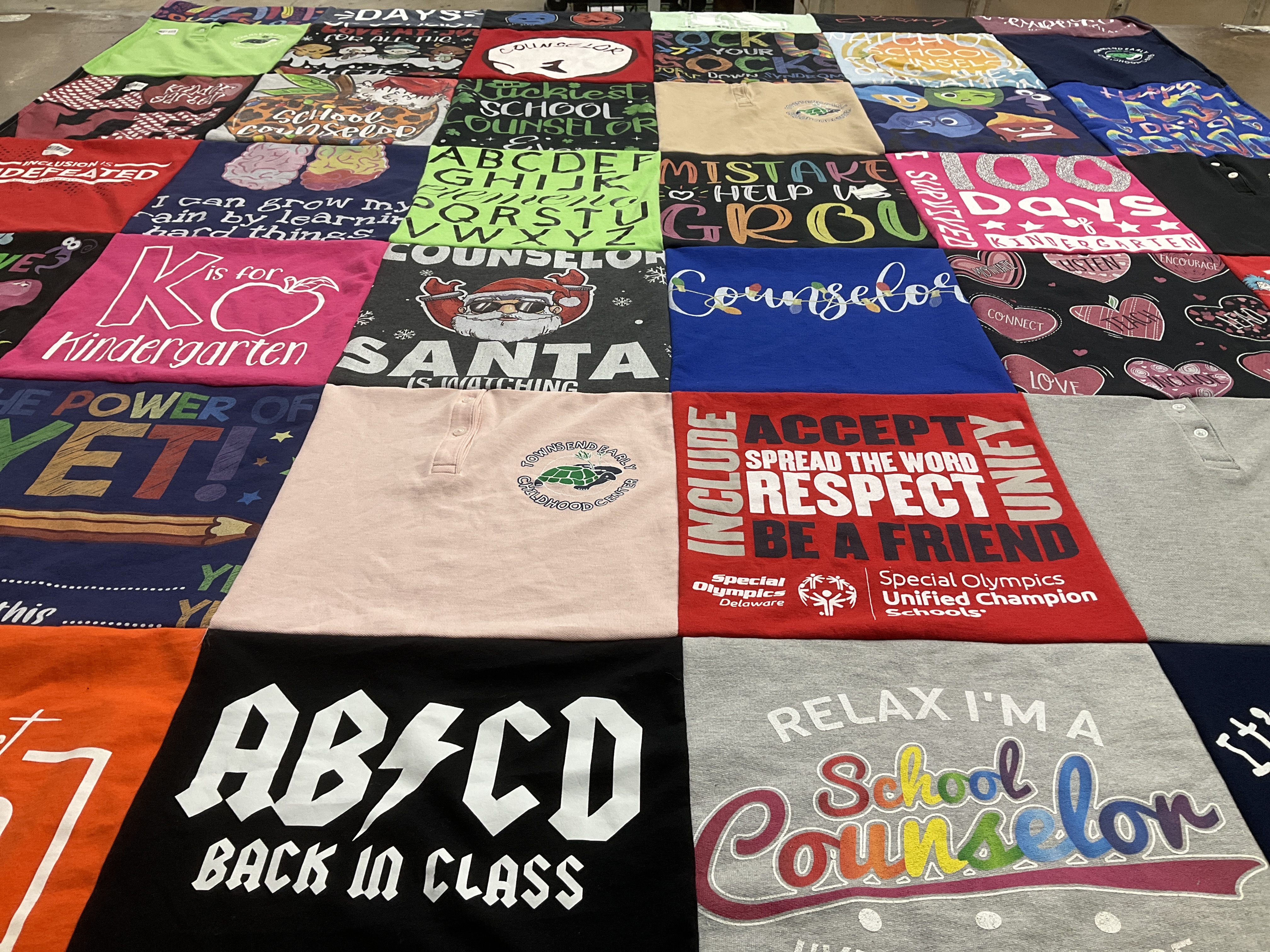 T-shirt quilt with education, counseling themes by Lynda from DE