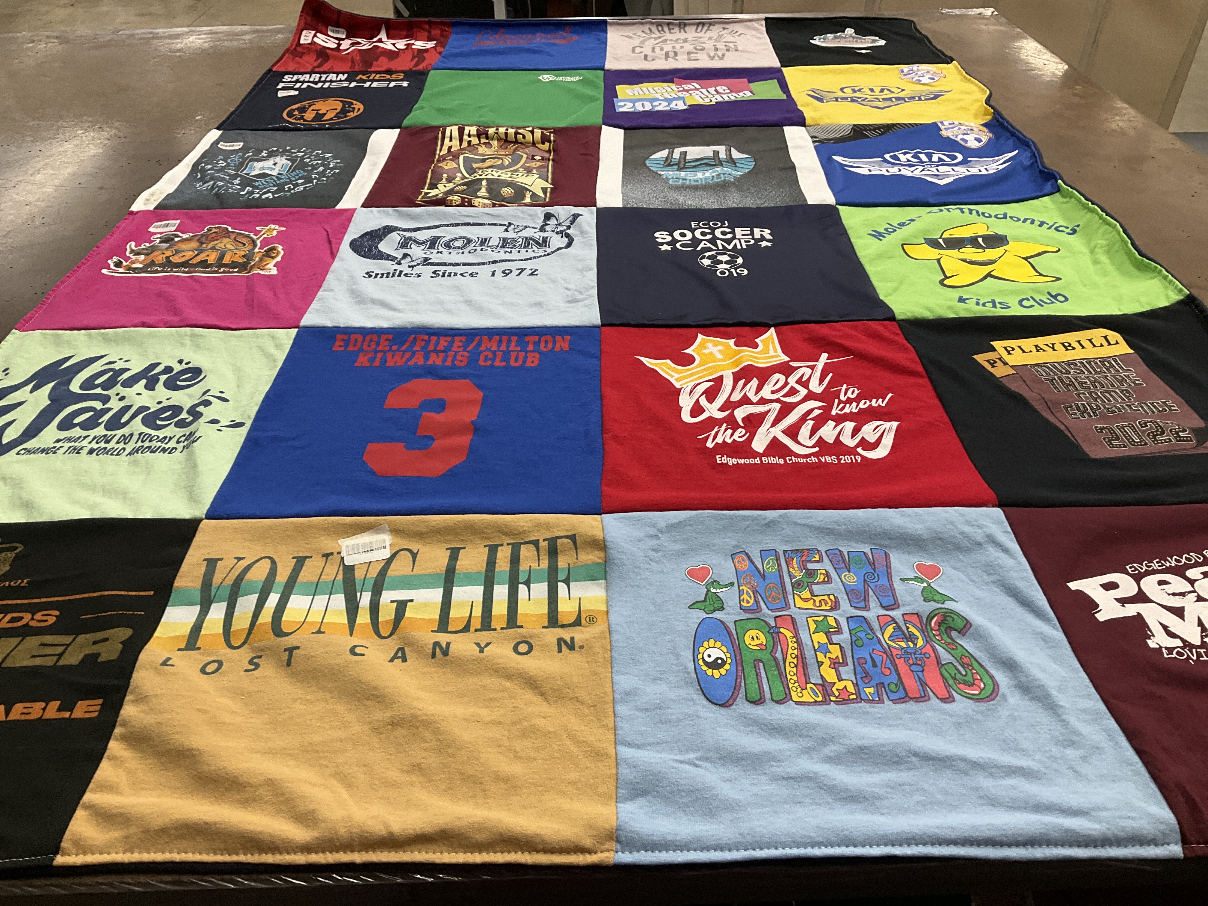 T-shirt quilt with community service, youth activities themes by Bethany from AZ