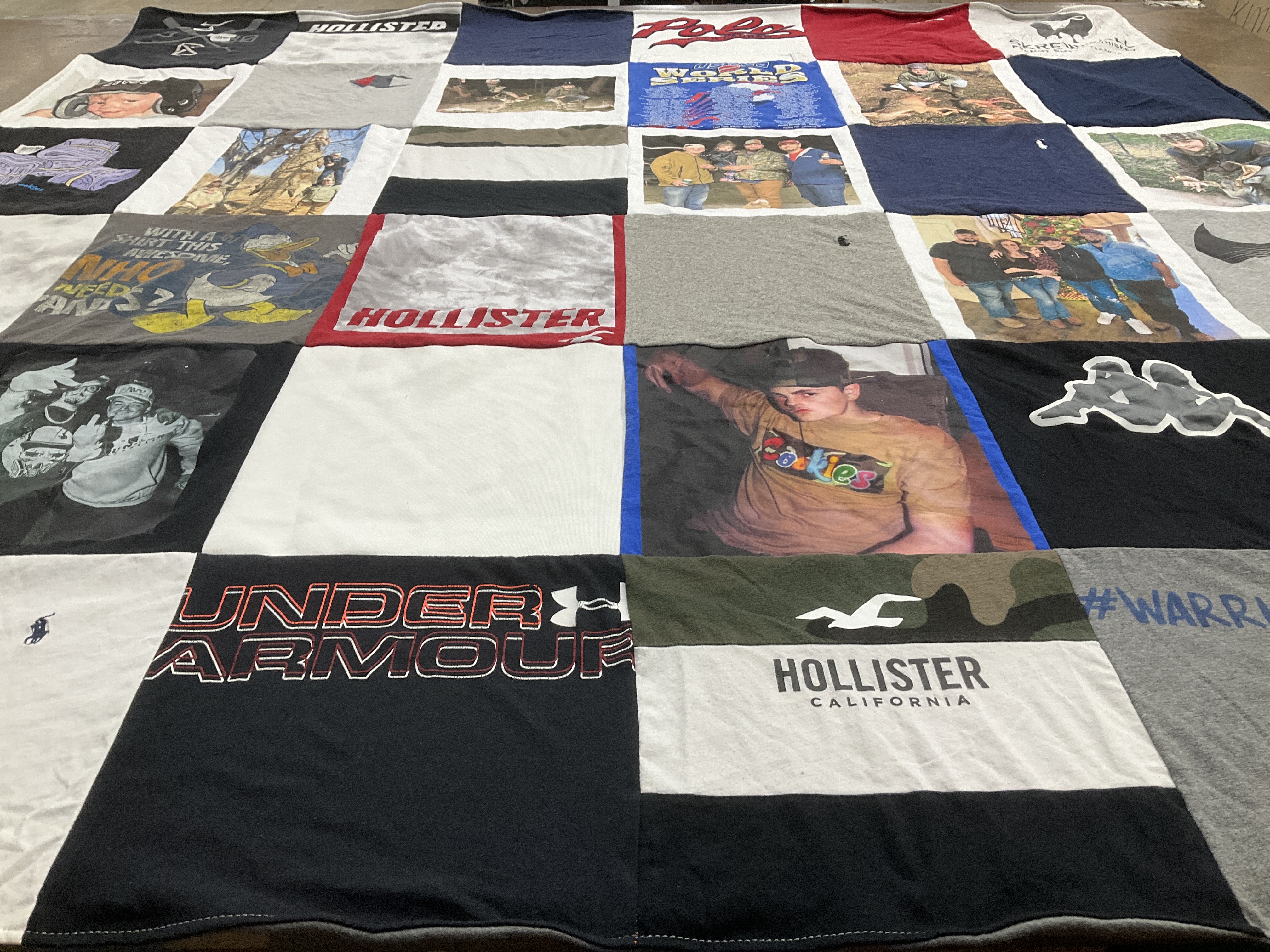 T-shirt quilt with sports, hunting themes by Molly from TX