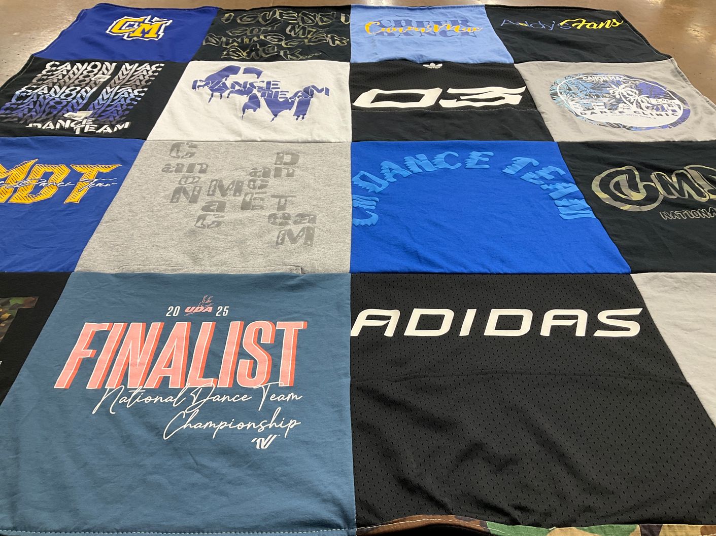 T-shirt quilt featuring canon macmillan dance team by Sarah from PA