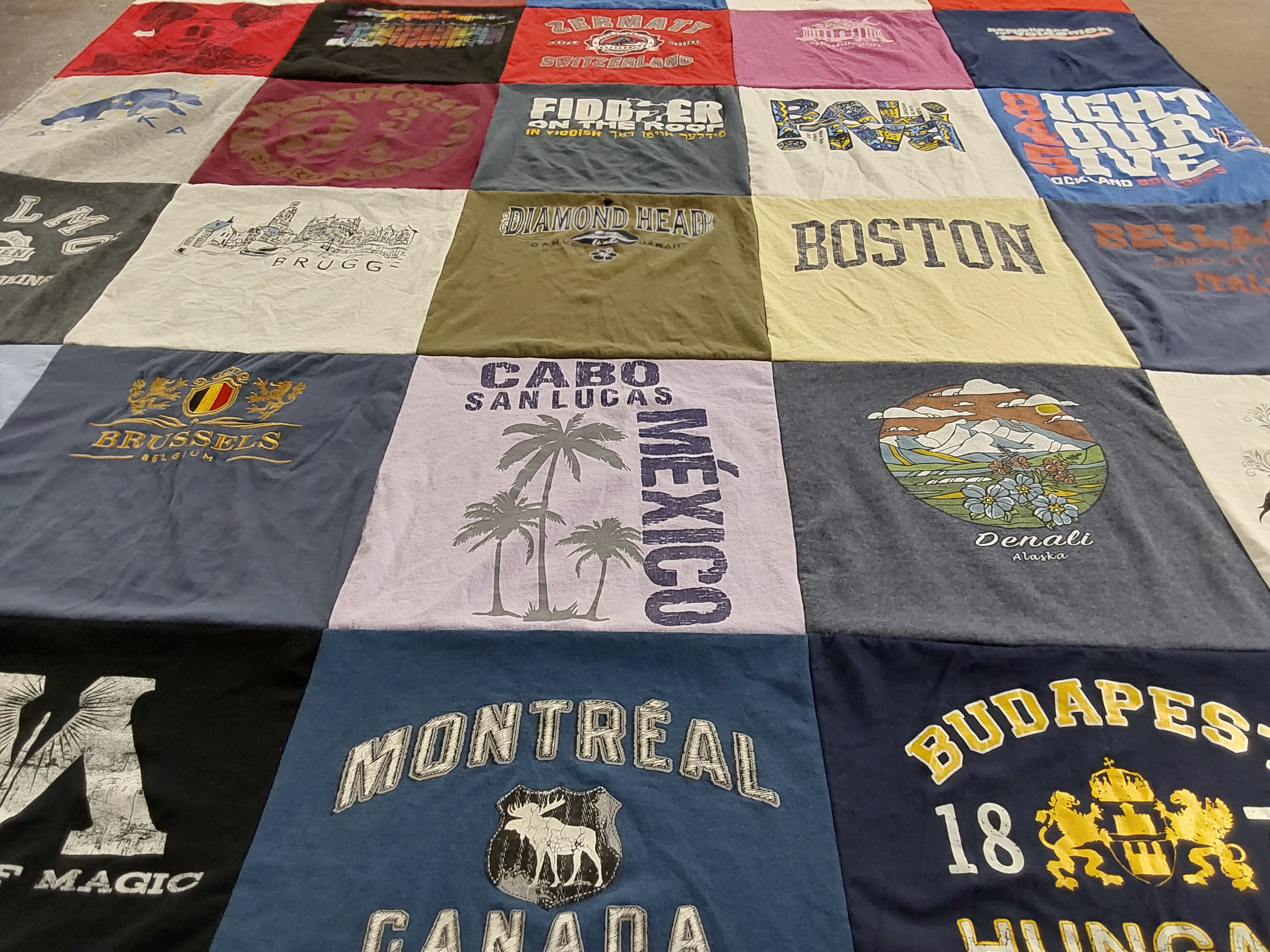 T-shirt quilt with travel, geography themes by Lisa from NY