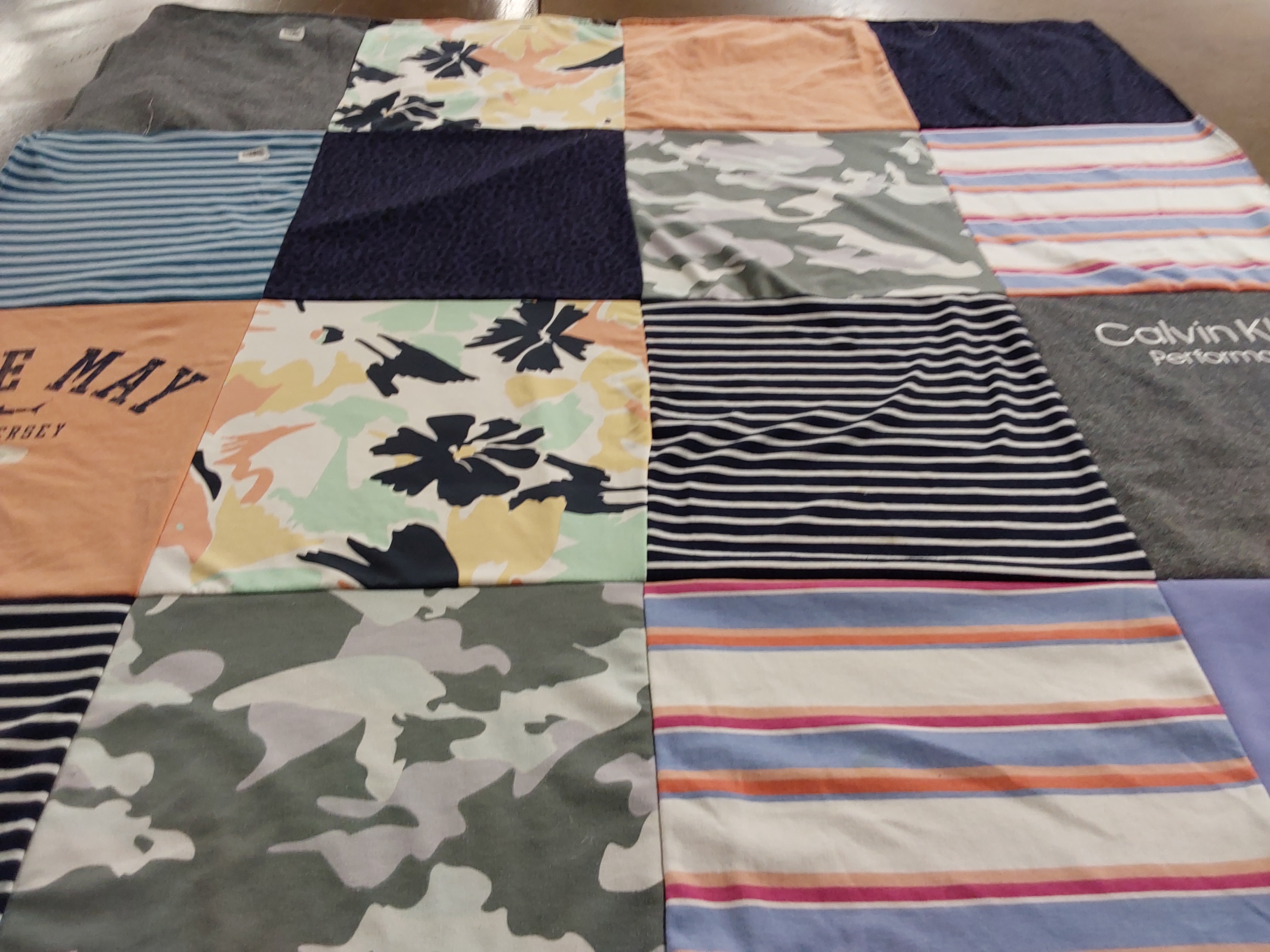 T-shirt quilt with fashion, sports themes by Jamie from NJ