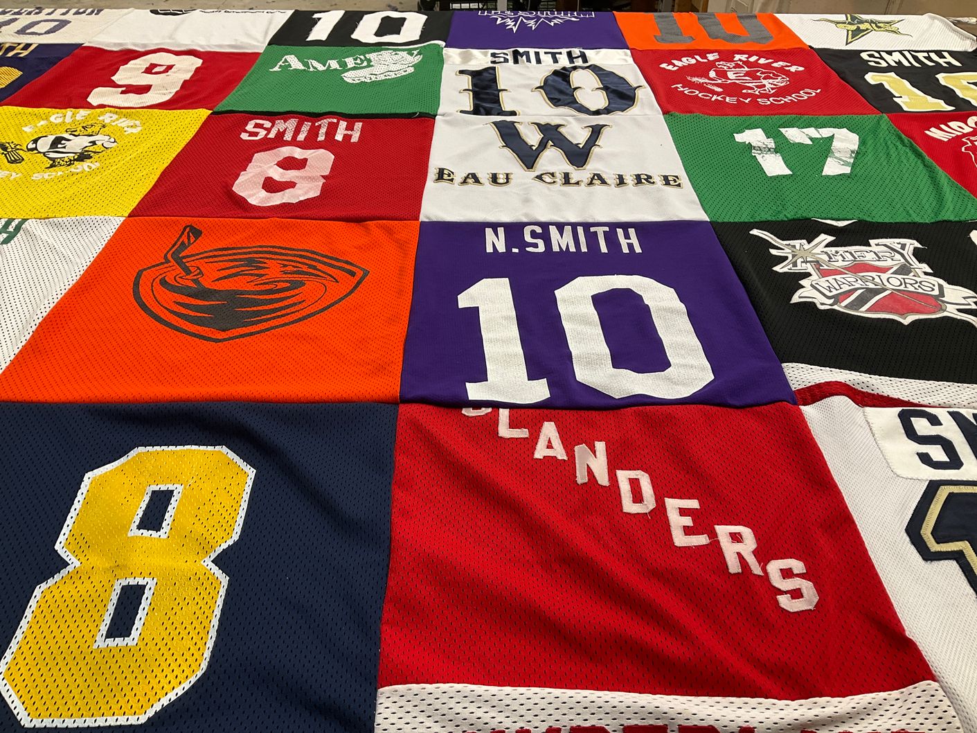 T-shirt quilt featuring eagle river hockey school, tornadoes by Kaitlin from CO