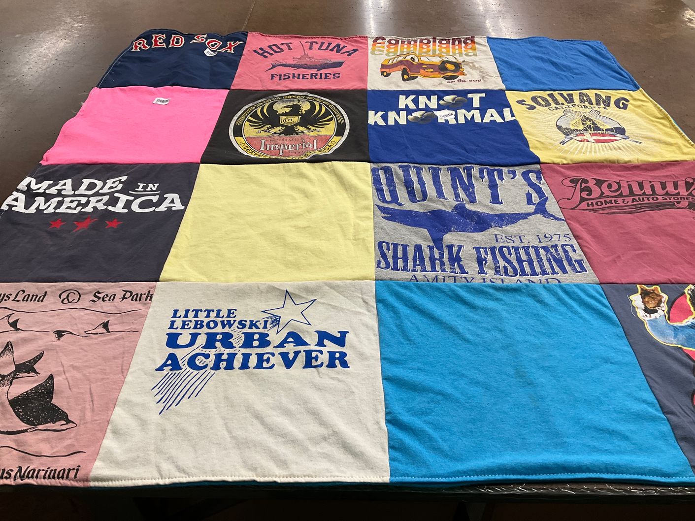 T-shirt quilt with fishing, automotive themes by Carl from CT