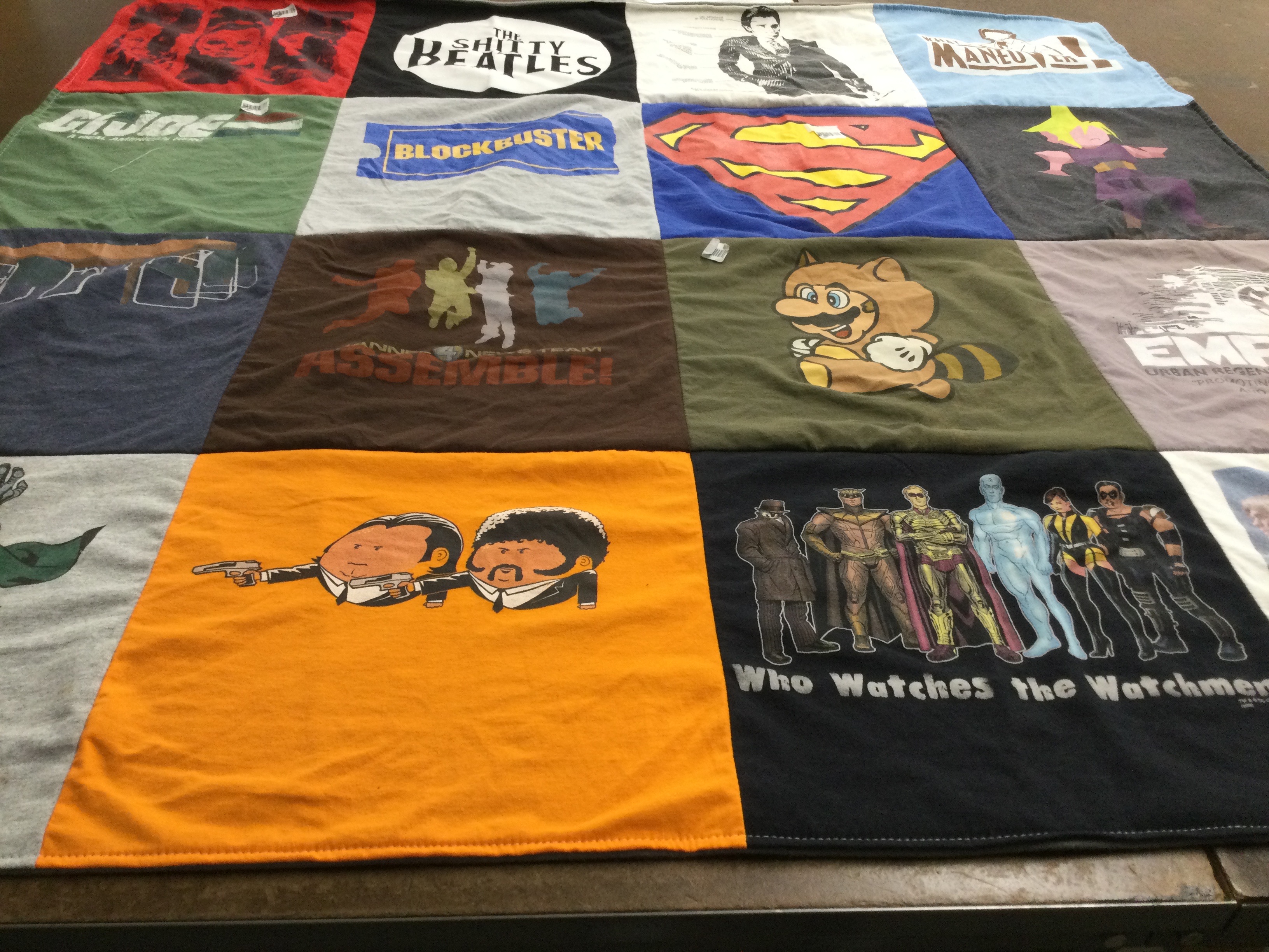 T-shirt quilt with comics, movies themes by Ashley from MA