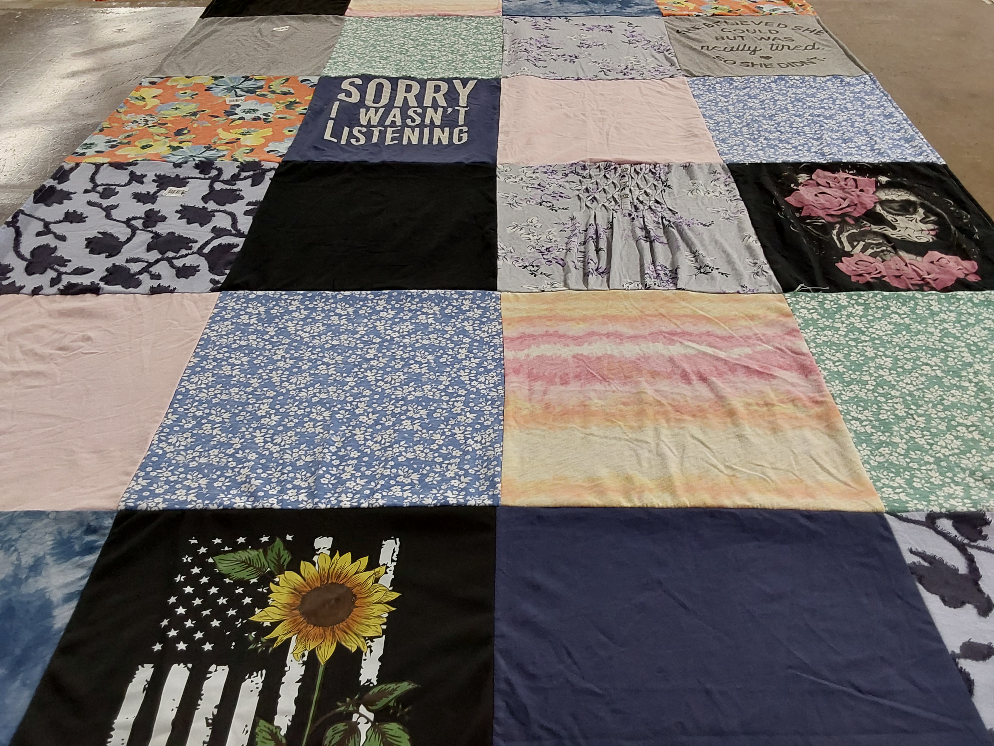 T-shirt quilt with floral patterns, flags themes by Melissa from NJ