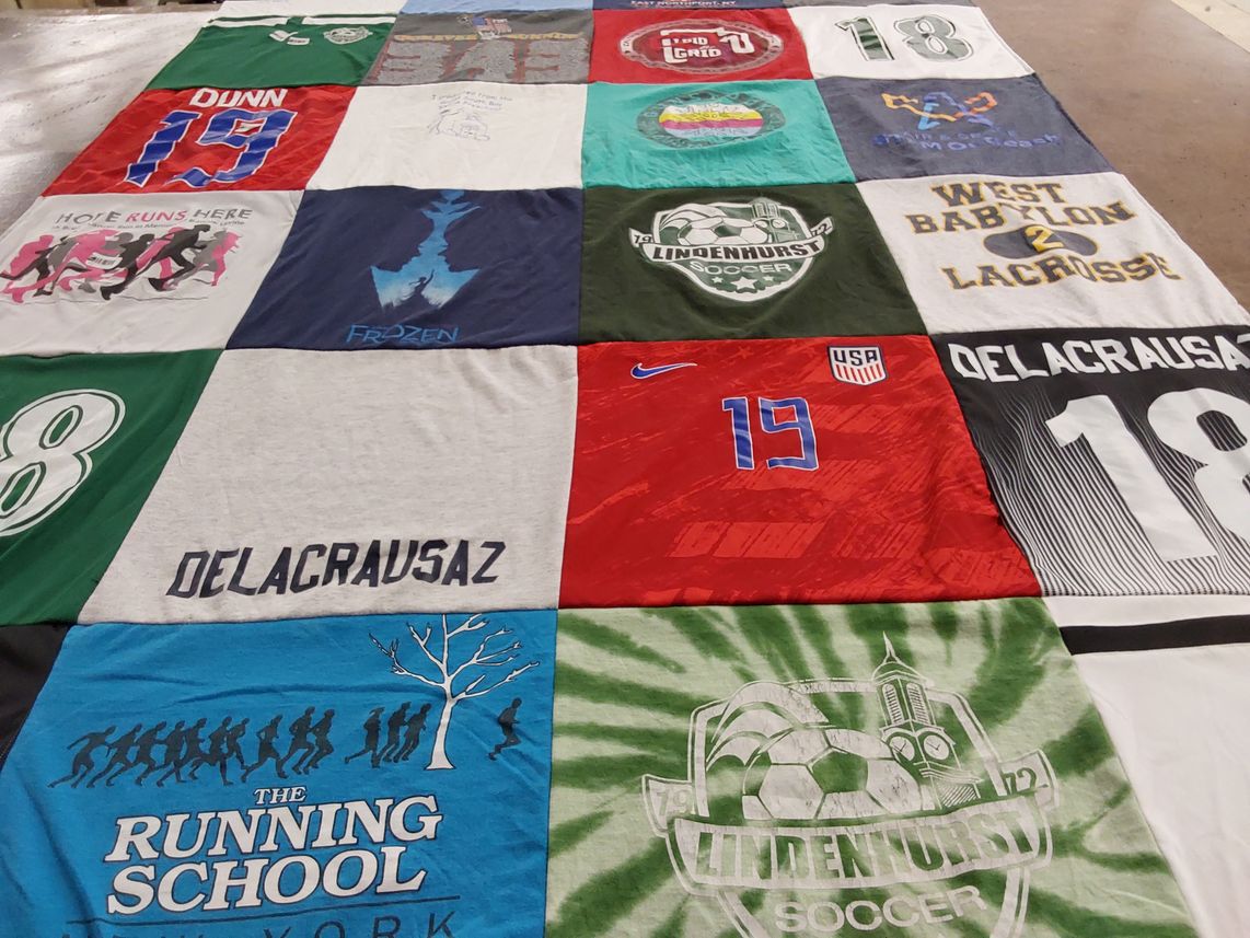 T-shirt quilt with soccer, running themes by ALANNA from NY