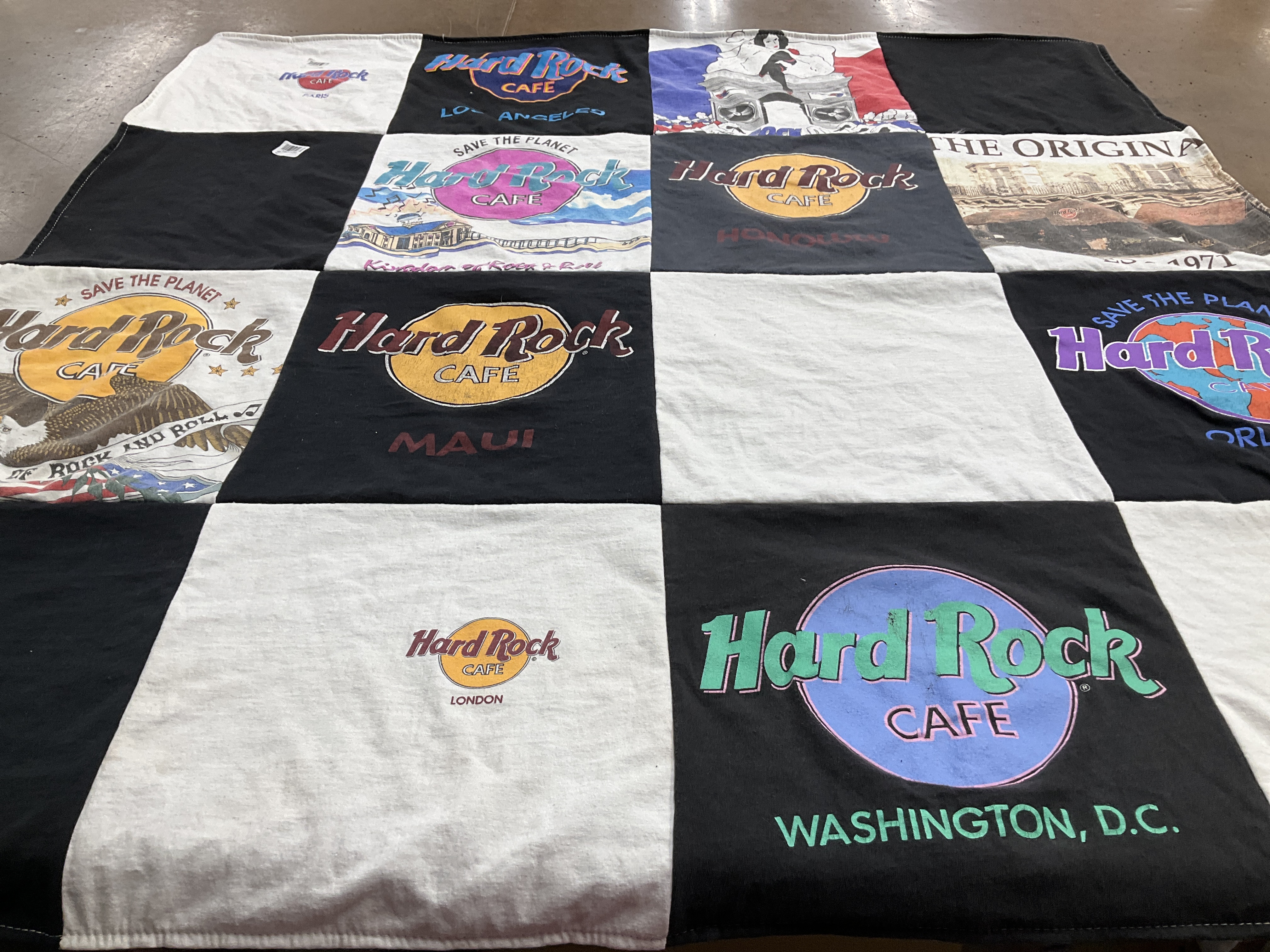 T-shirt quilt with music, travel themes by Carol from VA