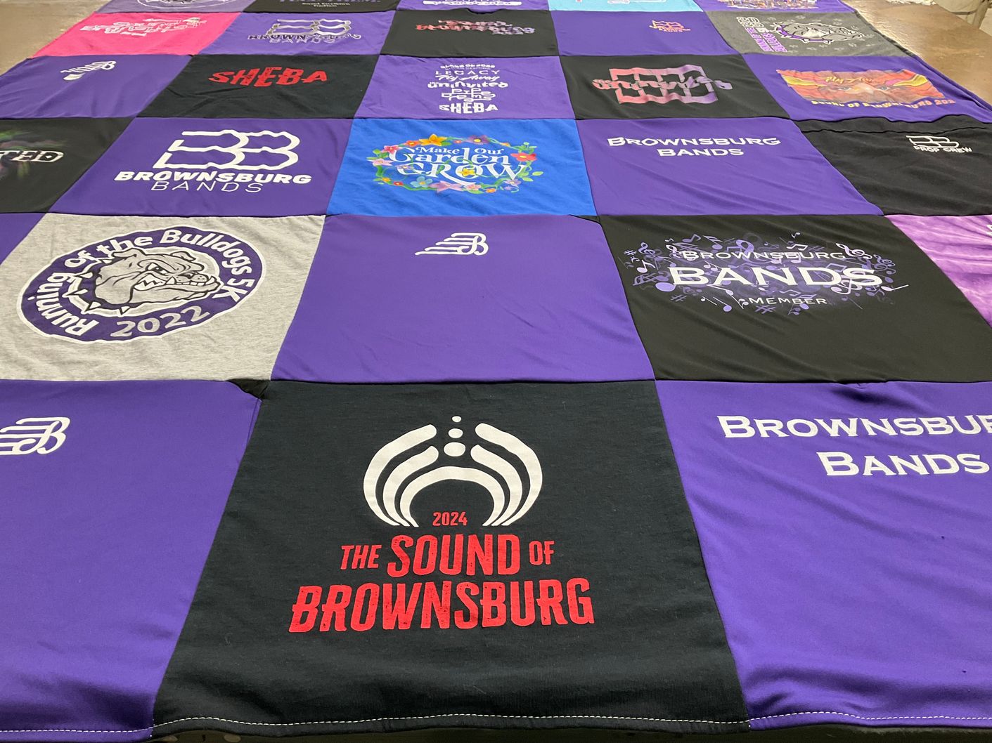 T-shirt quilt with band, running themes by Kimberly from IN