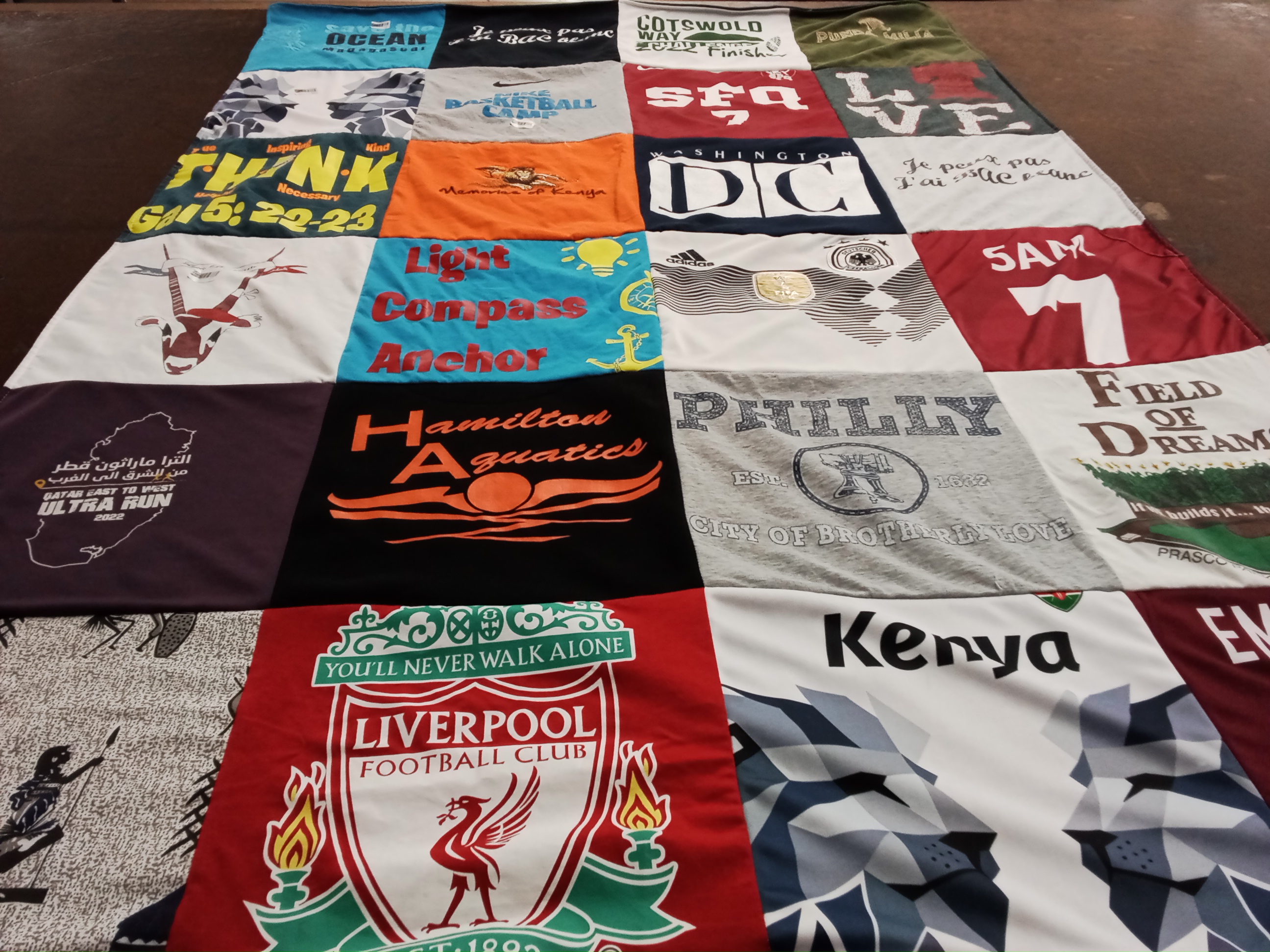 T-shirt quilt with sports, aquatics themes by Gloria from QC
