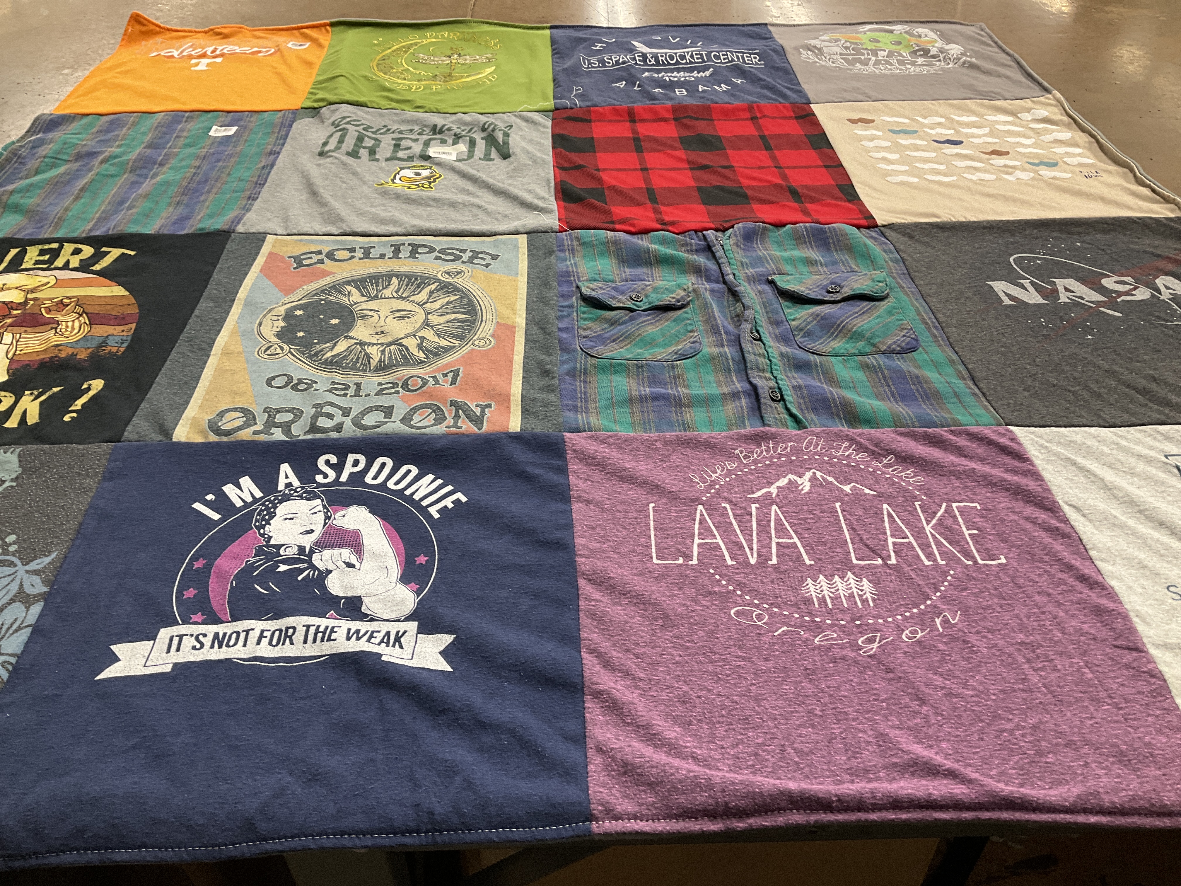T-shirt quilt with astronomy, outdoor activities themes by Kate from OR
