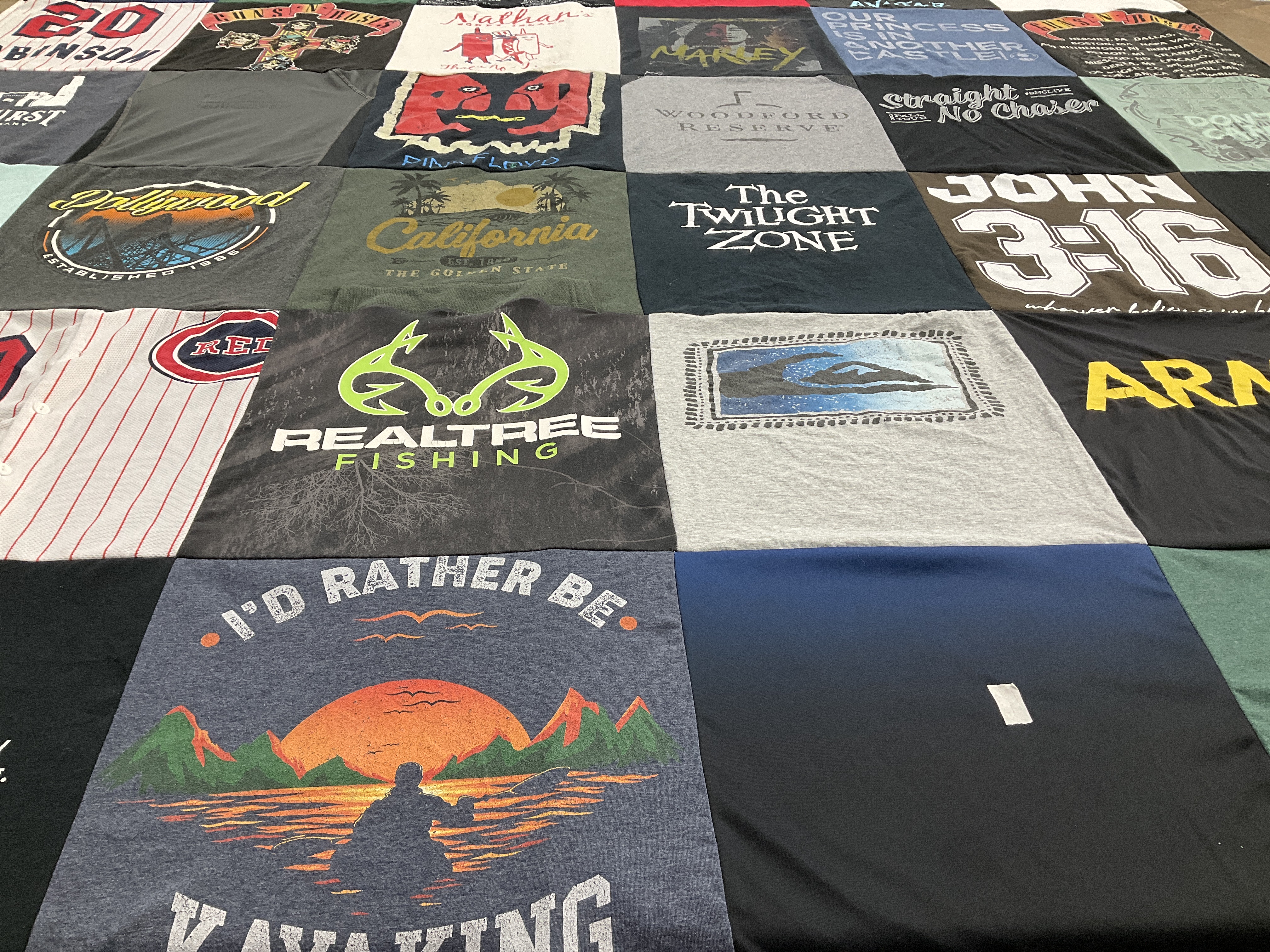 Custom Project Repat t-shirt quilt with cincinnati reds team logos.