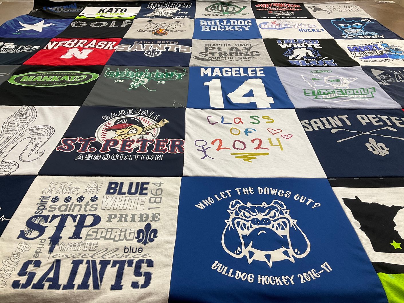 T-shirt quilt featuring bulldog hockey team, saint peter high school by Heather from MN