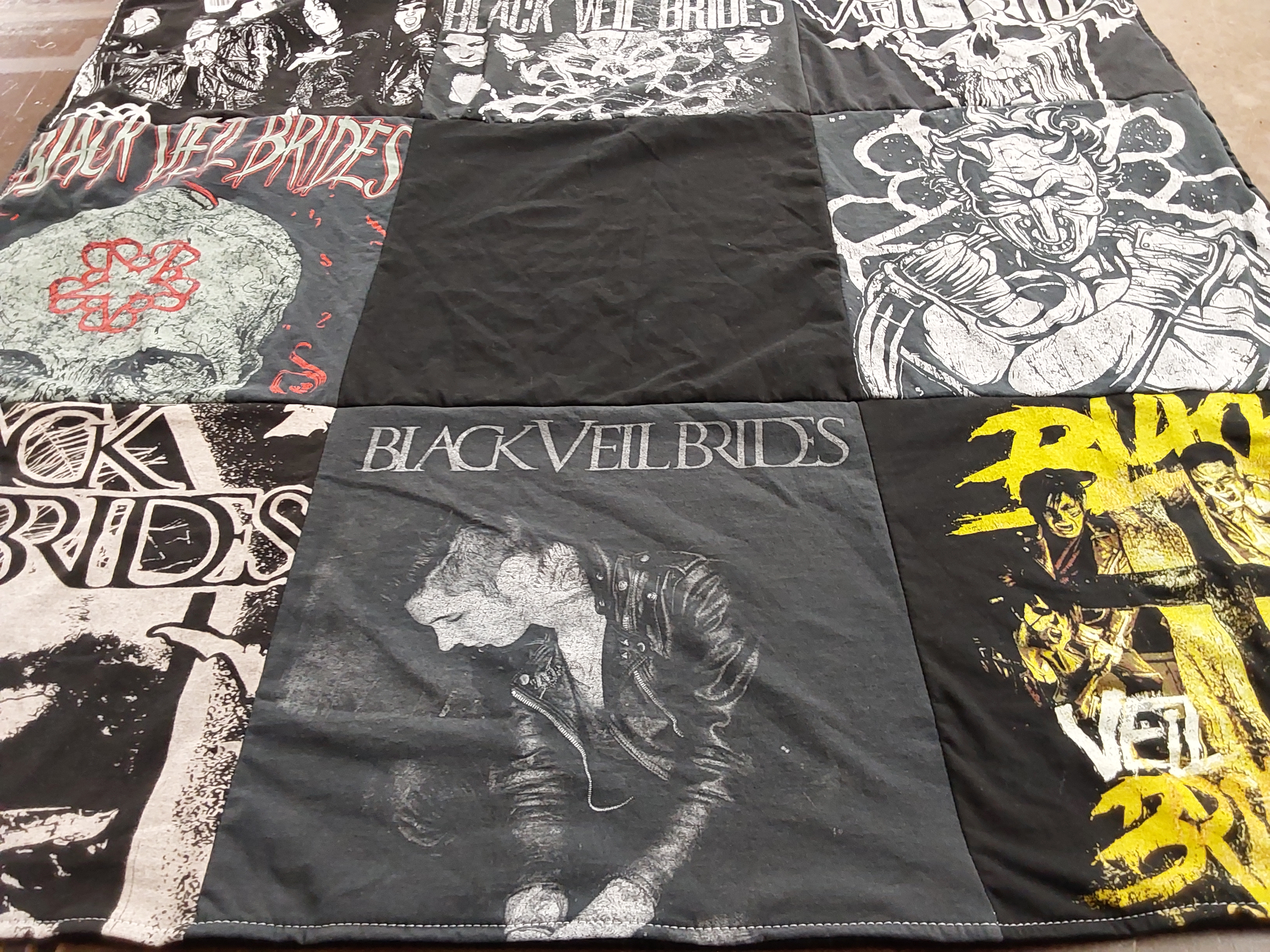 T-shirt quilt with music, rock themes by Tara from IA